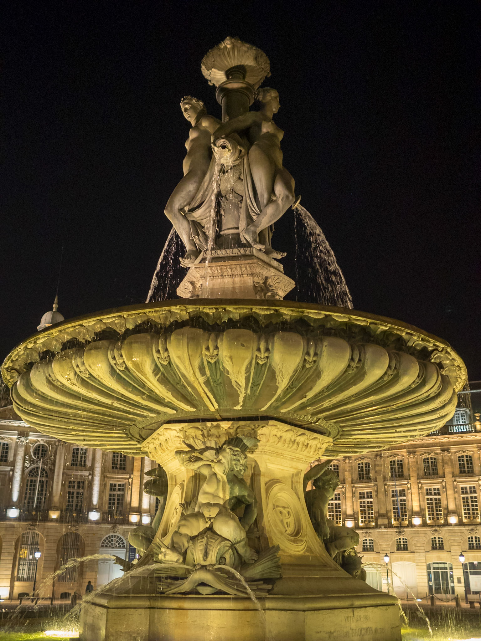 Detail of Place de la Bourse fountain at night