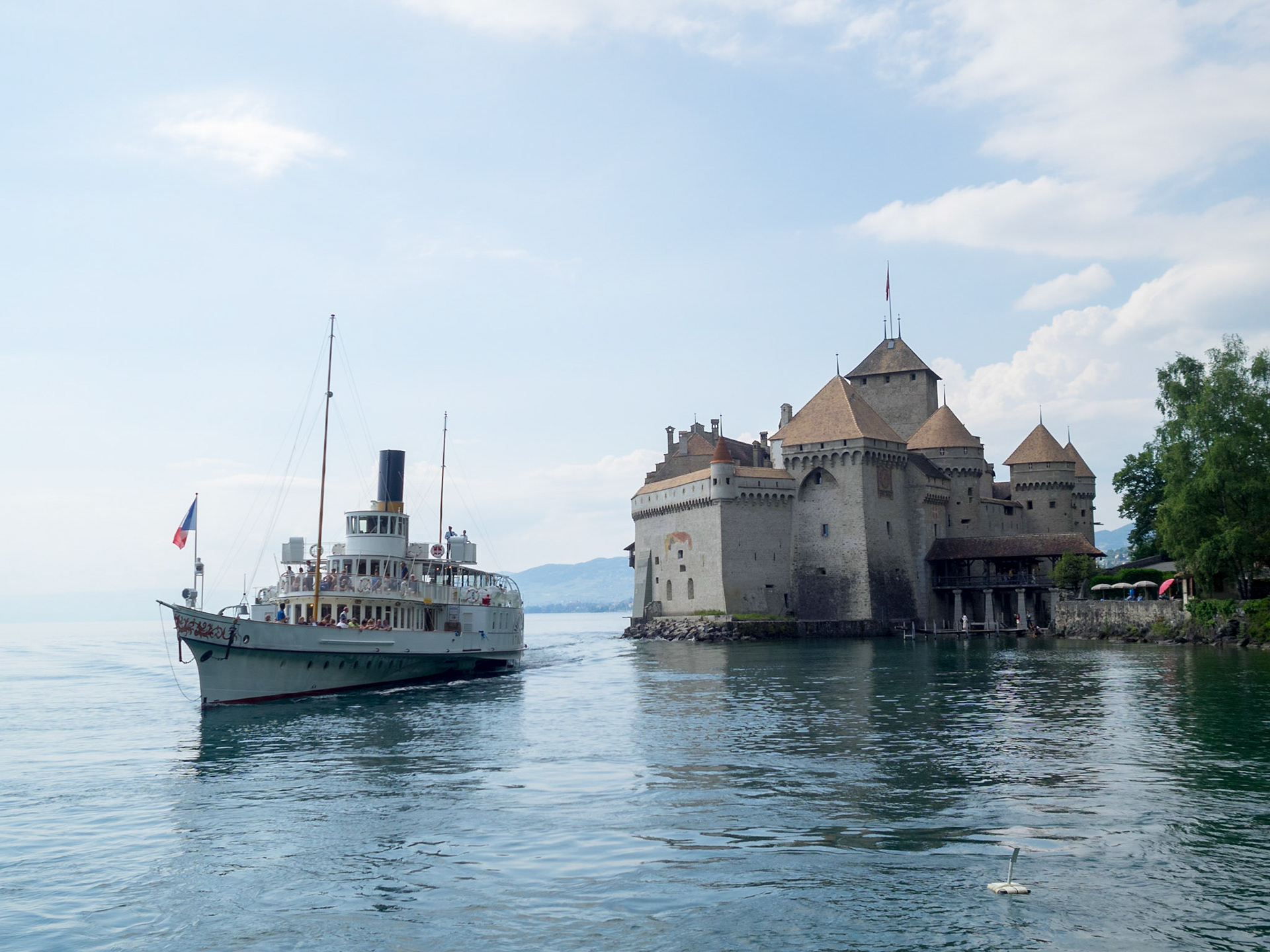 Geneva lake steamboat by Chateau de Chillon