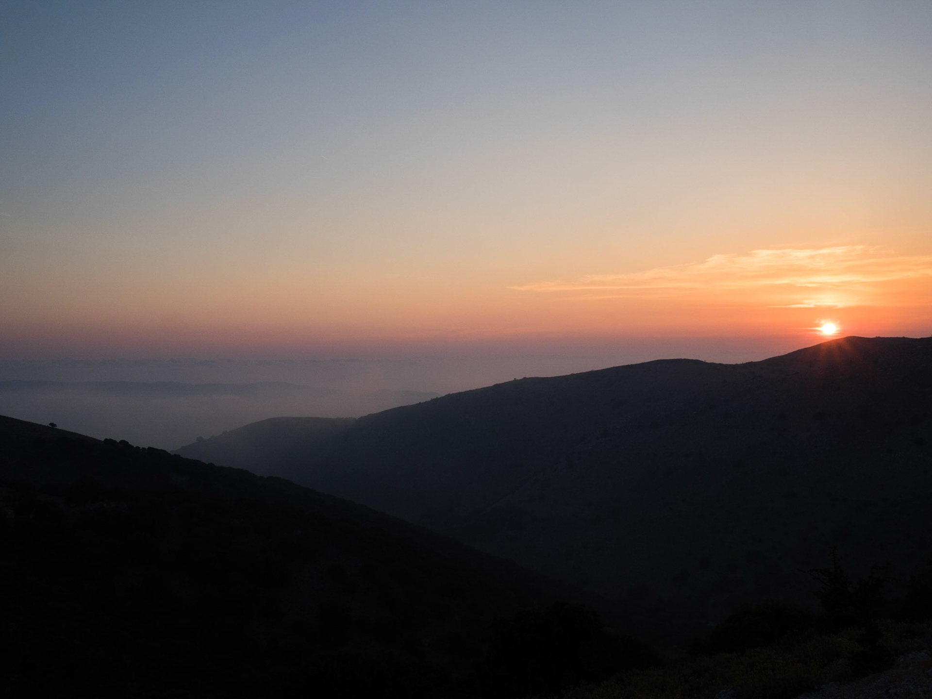 Sunset and mountain silhouette
