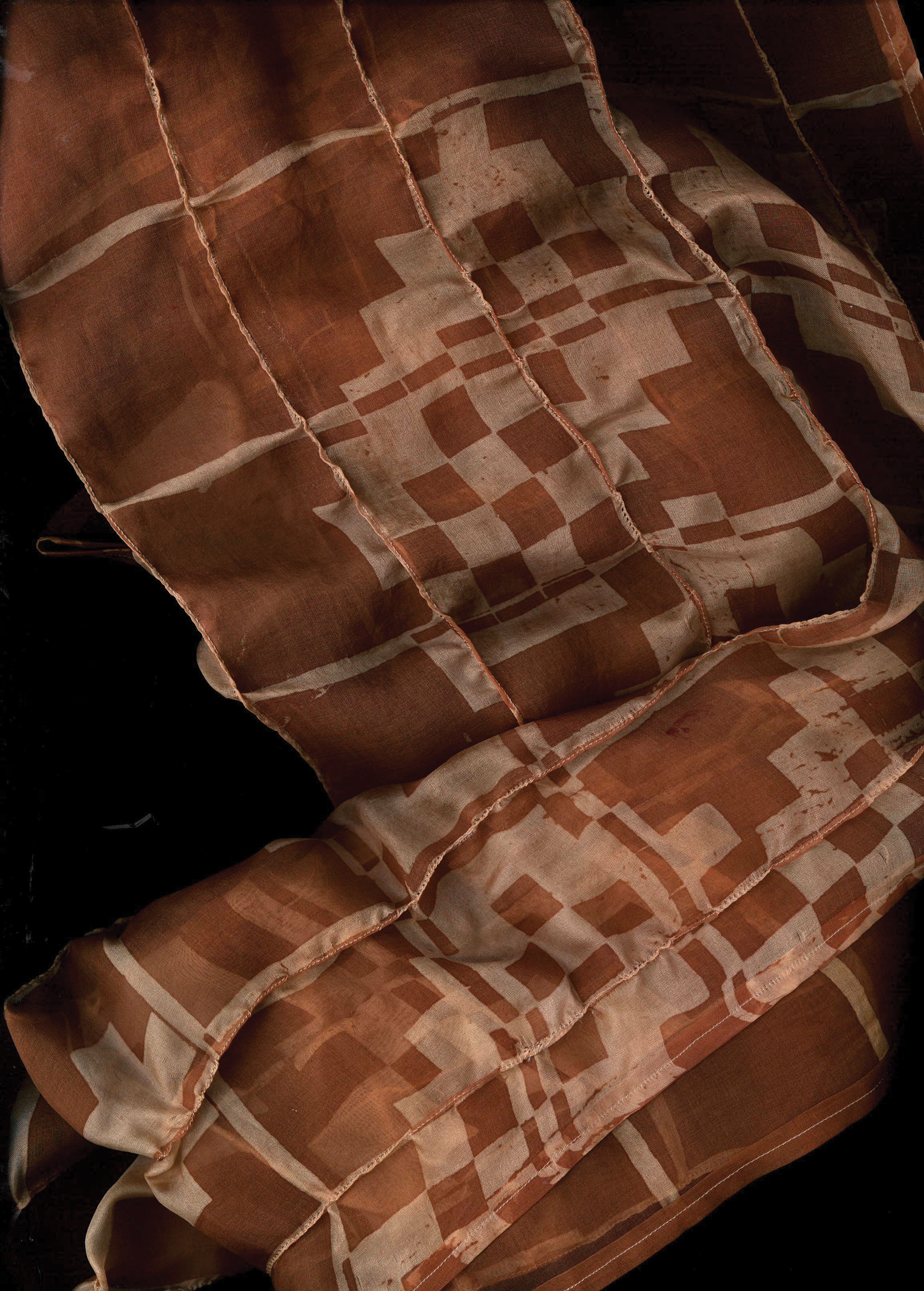 Silk organza dyed with madder-tea, and discharge printed with soda ash
