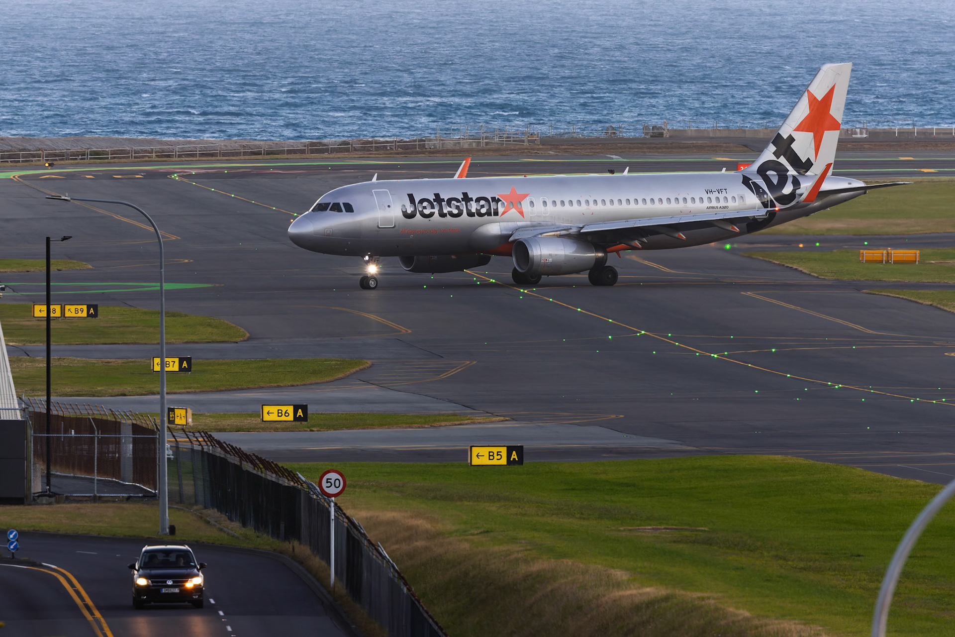 JetStar Airbus A320-232 [VH-VFT] Arriving from Christchurch at Wellington Airport from the Airport Lookout, New Zealand