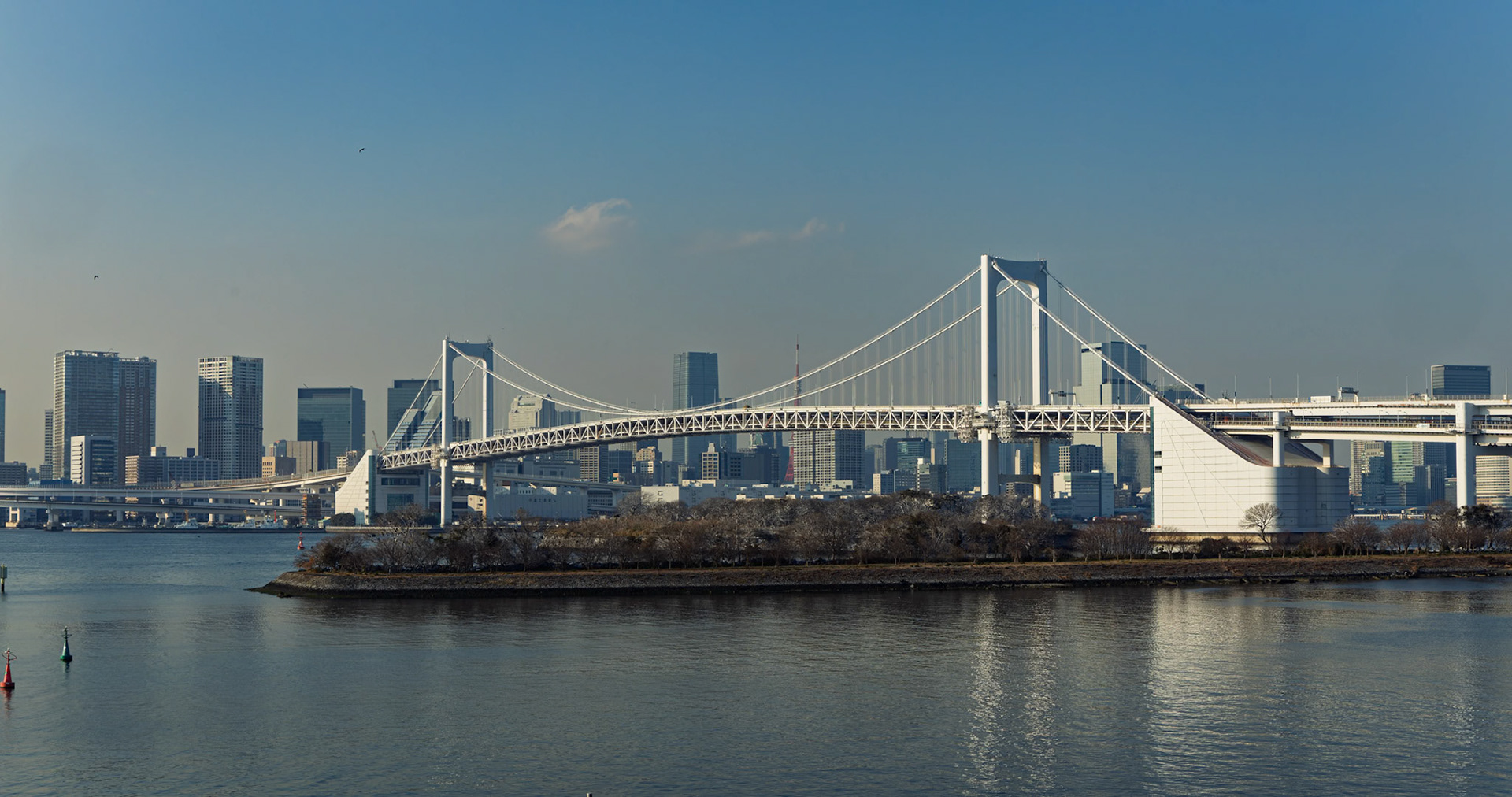Rainbow Bridge from Odaiba Seaside Park in Tokyo, Japan