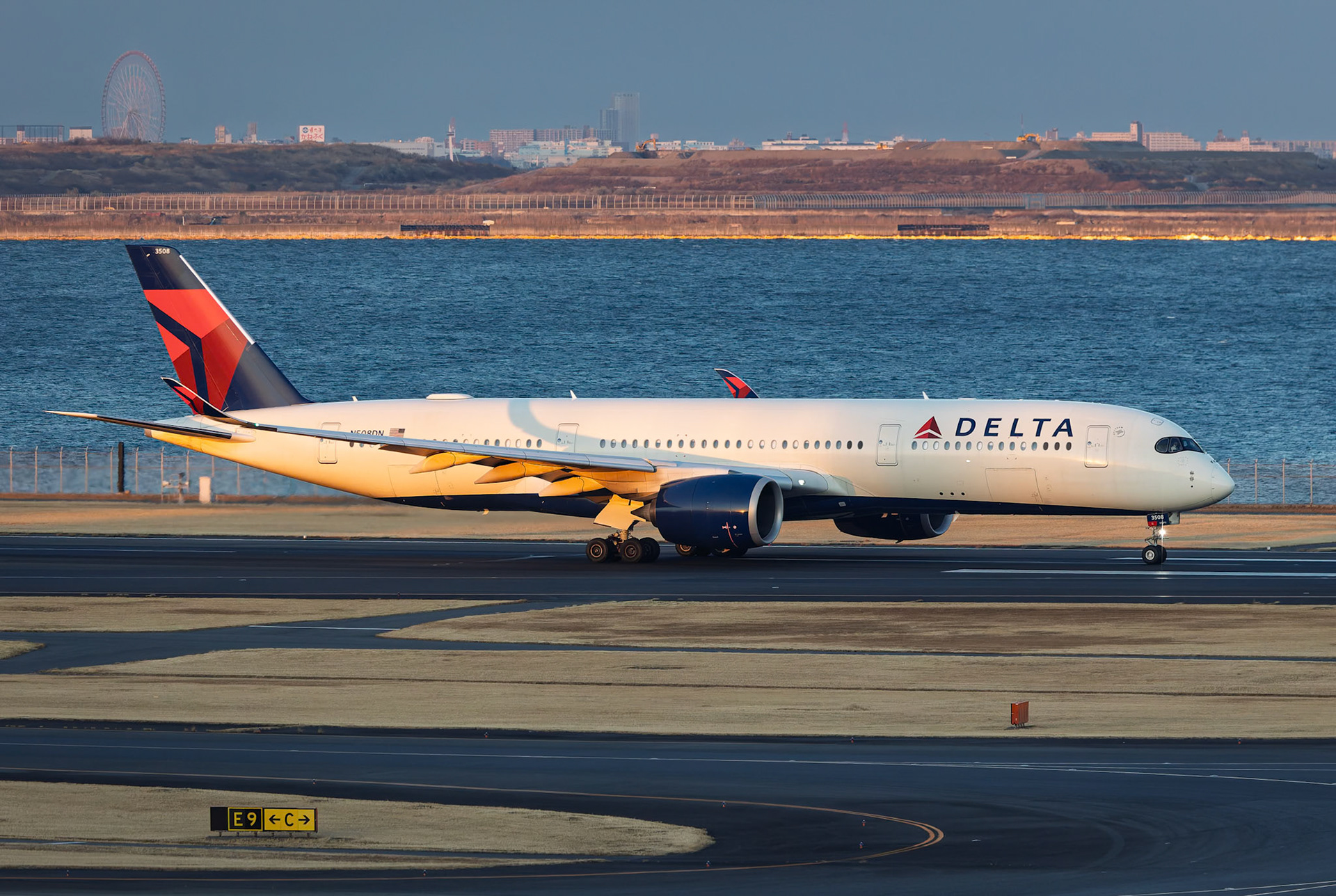 Delta Air Lines Airbus A350-941 (N508DN) Departing to Detroit, captured from Terminal 2 viewing platform at Haneda Airport in Tokyo, Japan