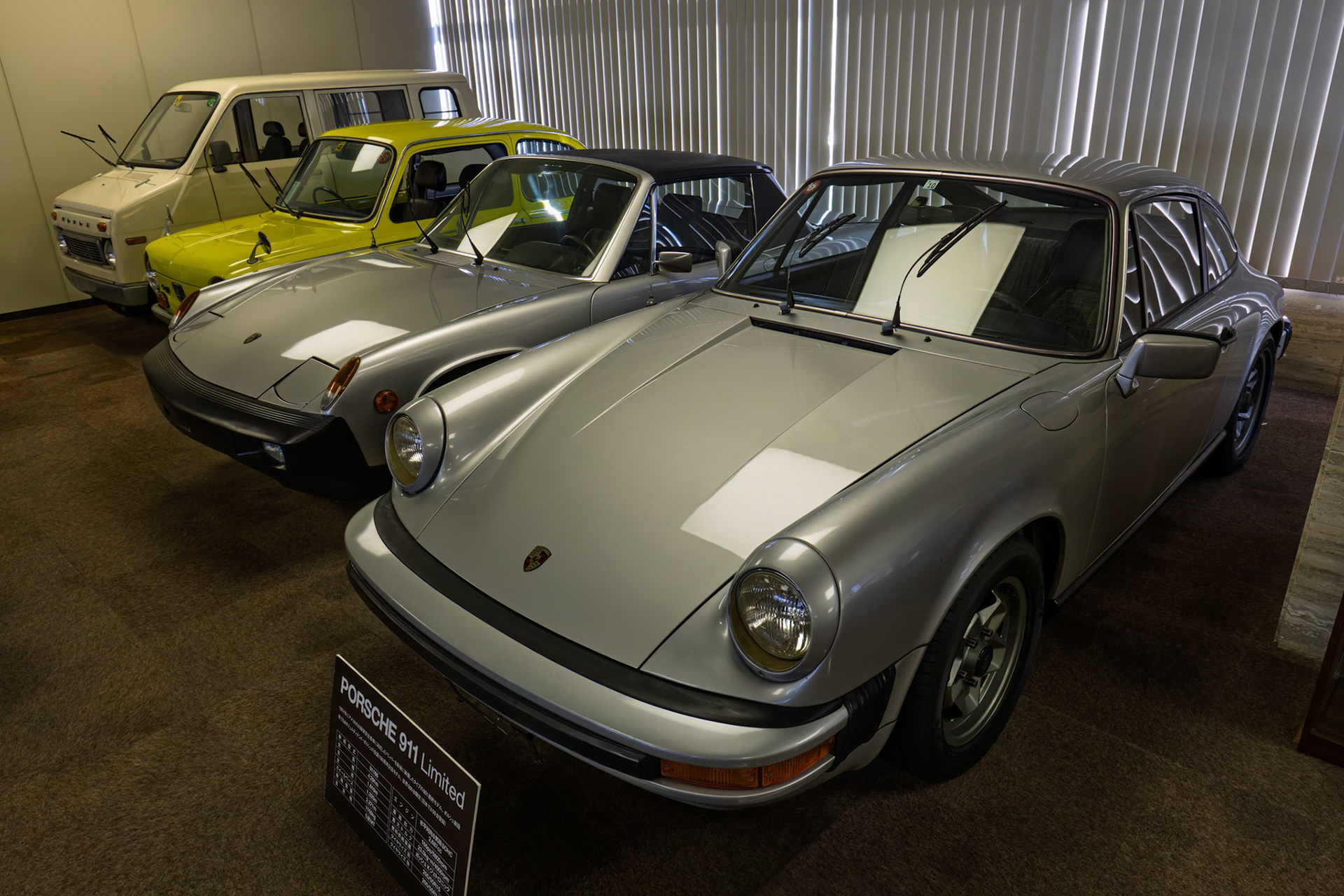 1974 Porsche 911 Limited and a few other crs on display at the Tamiya Corporate Headquarters in Suruga Ward, Shizuoka, Japan