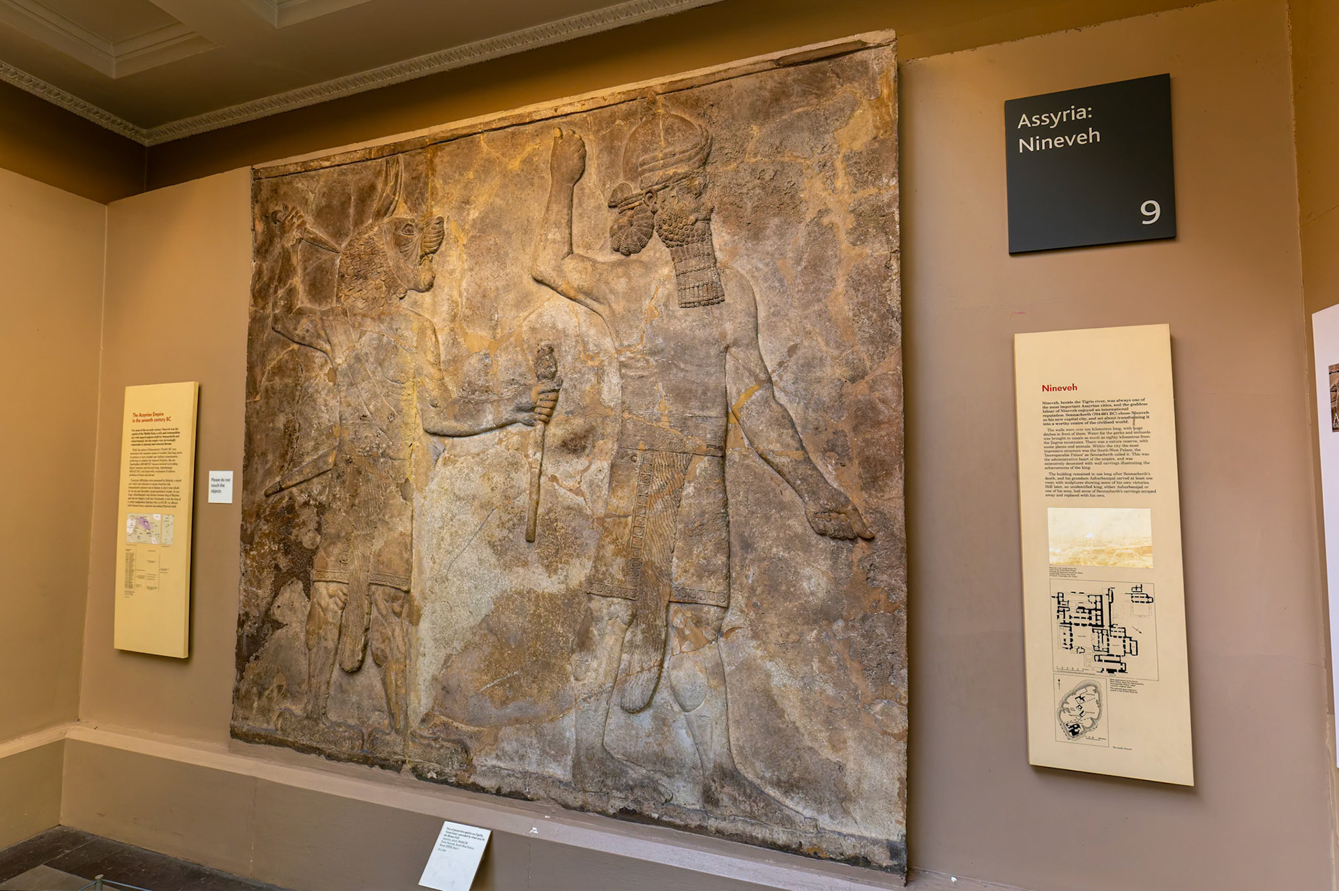 Pair of Protective spirits an Ugallu, 'Great Lion', precede by what may be the House God display at British Museum, London
