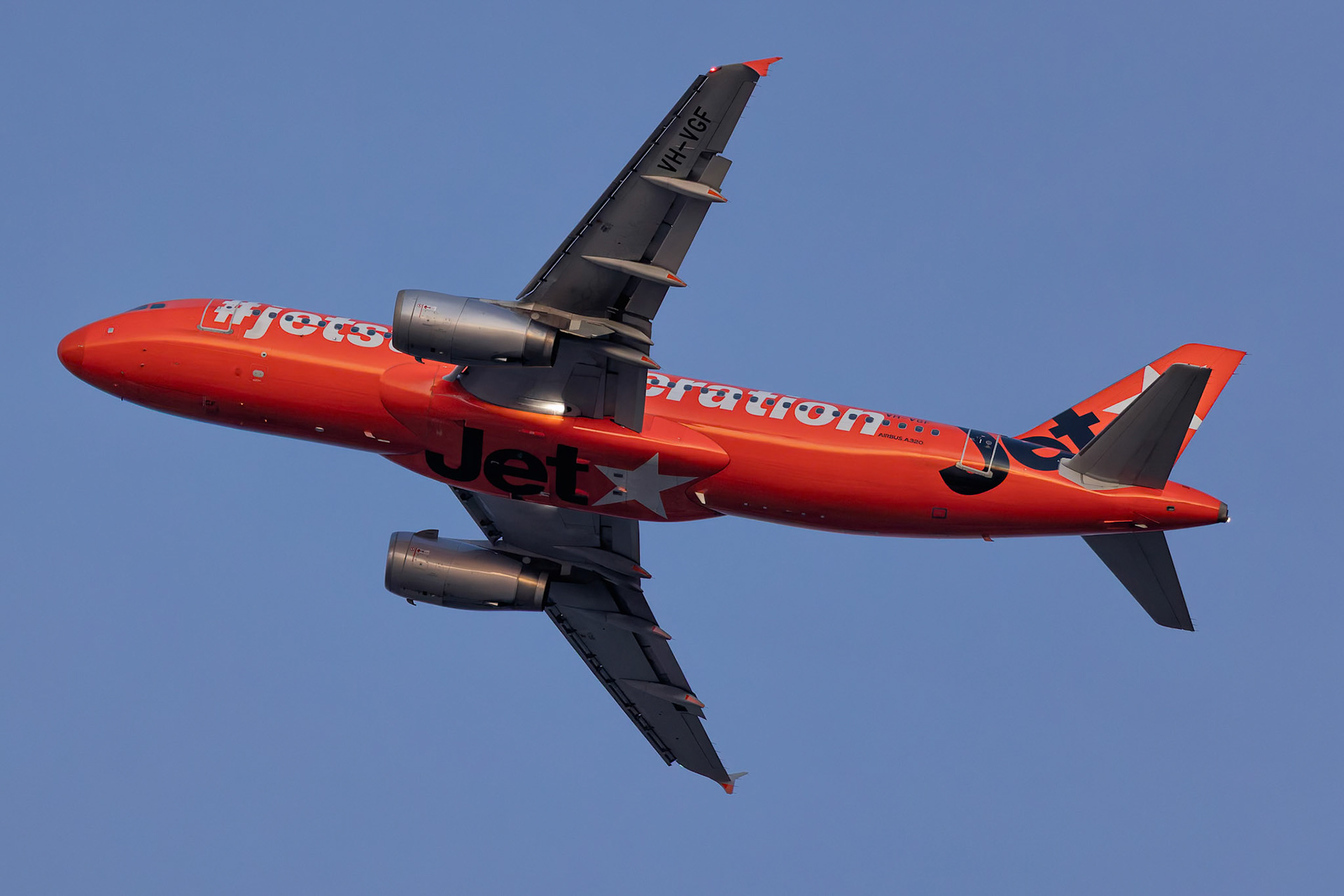 Jetstar Airbus A320-232 (10th Anniversary) [VH-VGF] Arriving from Hervey Bay from the P3 Carpark, Sydney Airport, Australia