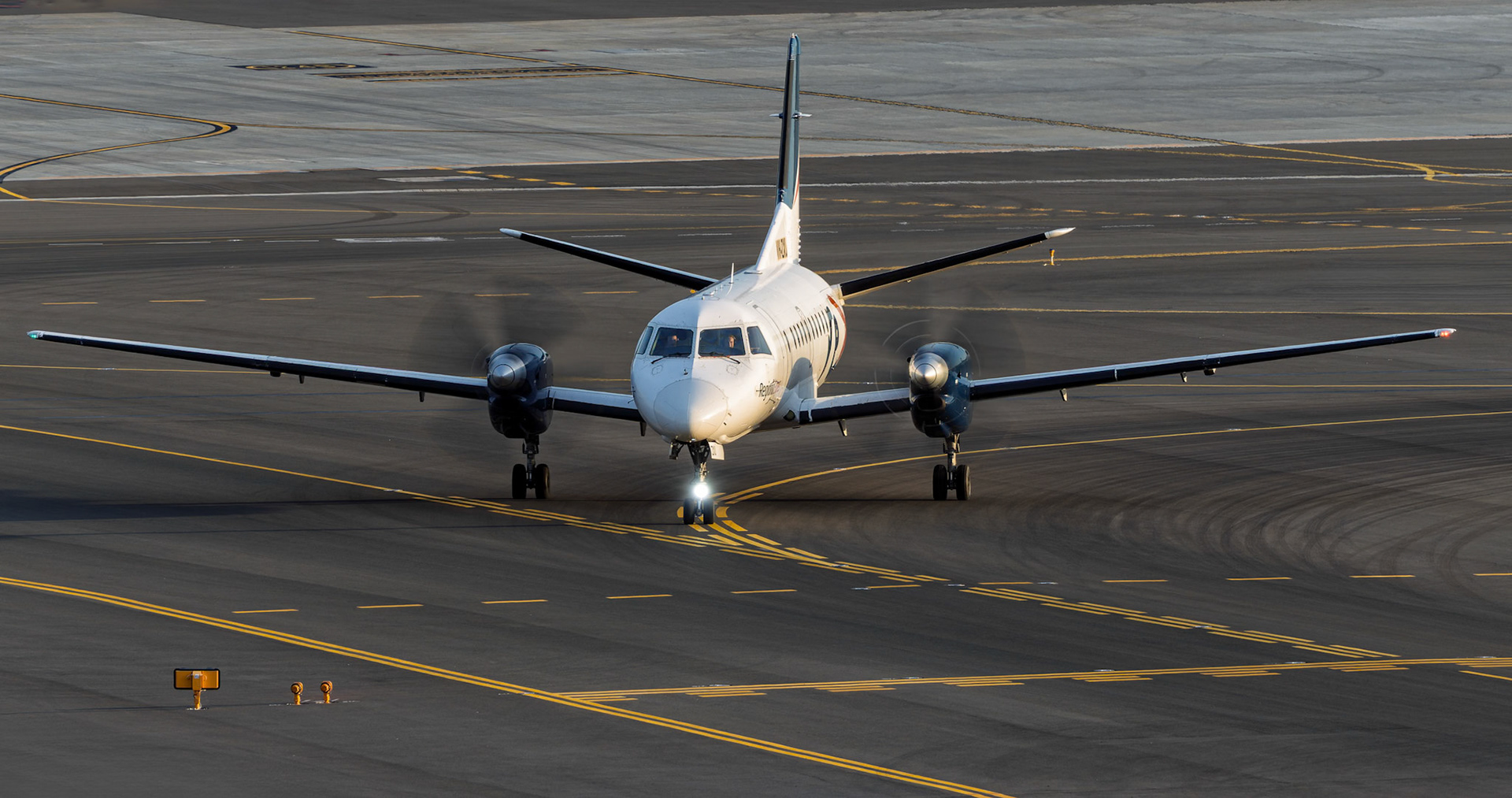 Regional Express Saab 340B+ [VH-ZXU] Arriving from Moruya from the P3 Carpark, Sydney Airport, Australia
