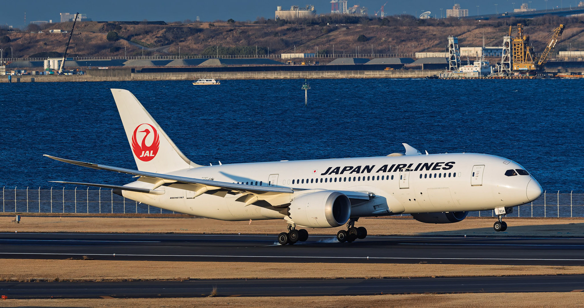 Japan Airlines Boeing 787-8 Dreamliner (JA834J) Arriving from Beijing, China, captured from Terminal 2 viewing platform at Haneda Airport in Tokyo, Japan