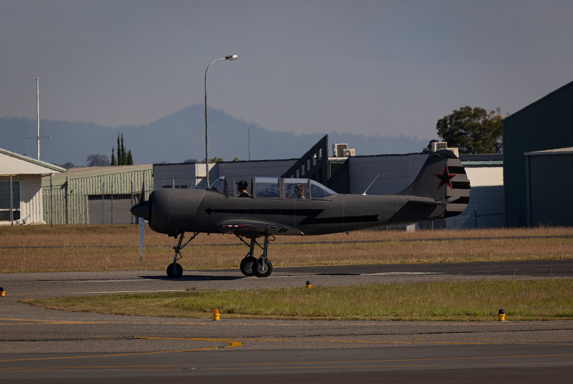 Aerostar YAK-52 departing Archerfield Airport in Brisbane, Australia