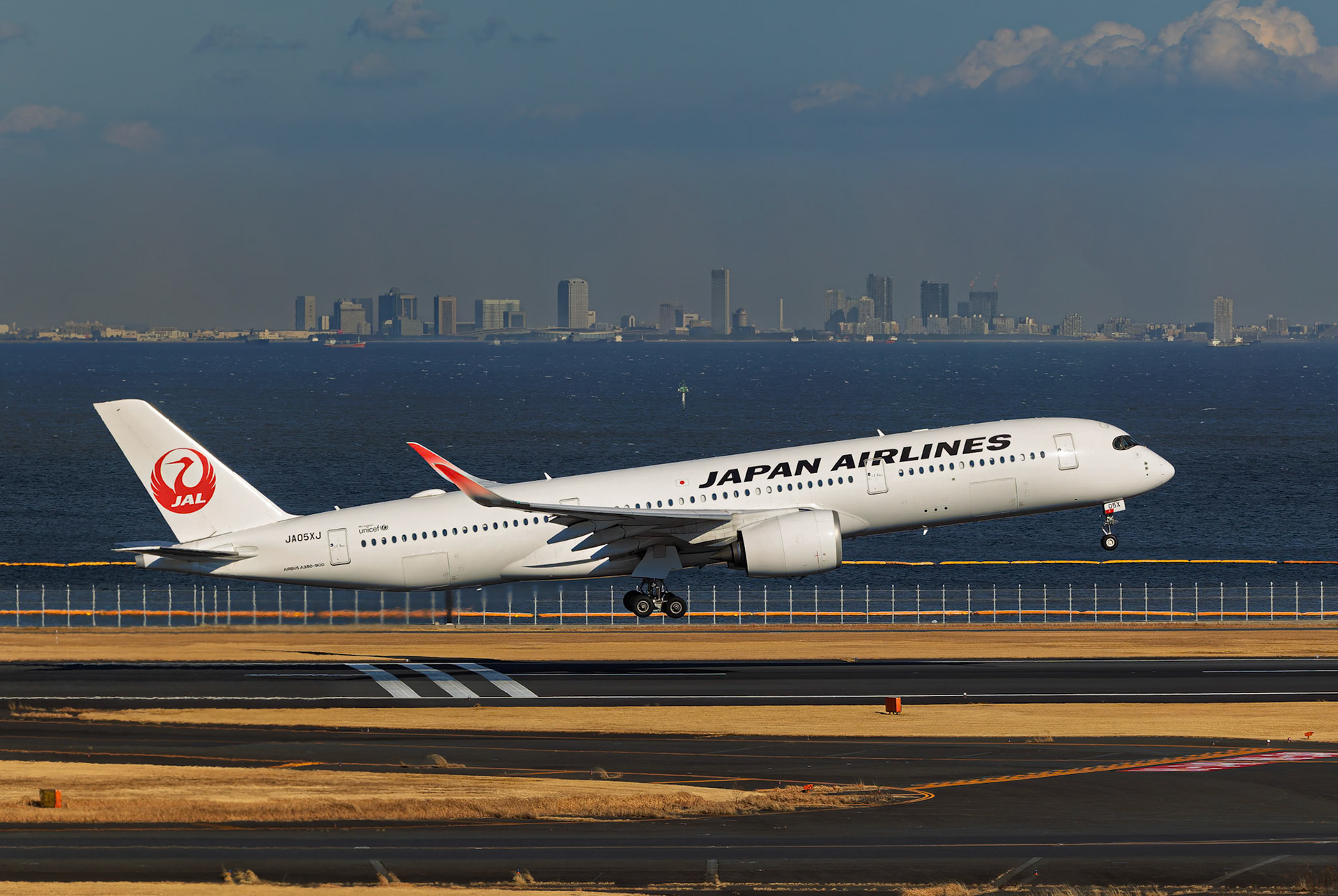 Japan Airlines Airbus A350-900 (JA05XJ) Departing to Fukuoka, Japan, captured from Terminal 2 viewing platform at Haneda Airport in Tokyo, Japan