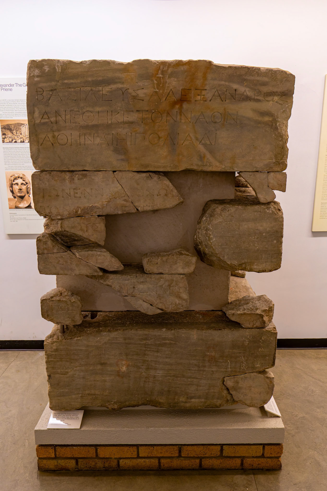 Part of the wall of the temple of Athena at Priene on display at British Museum, London