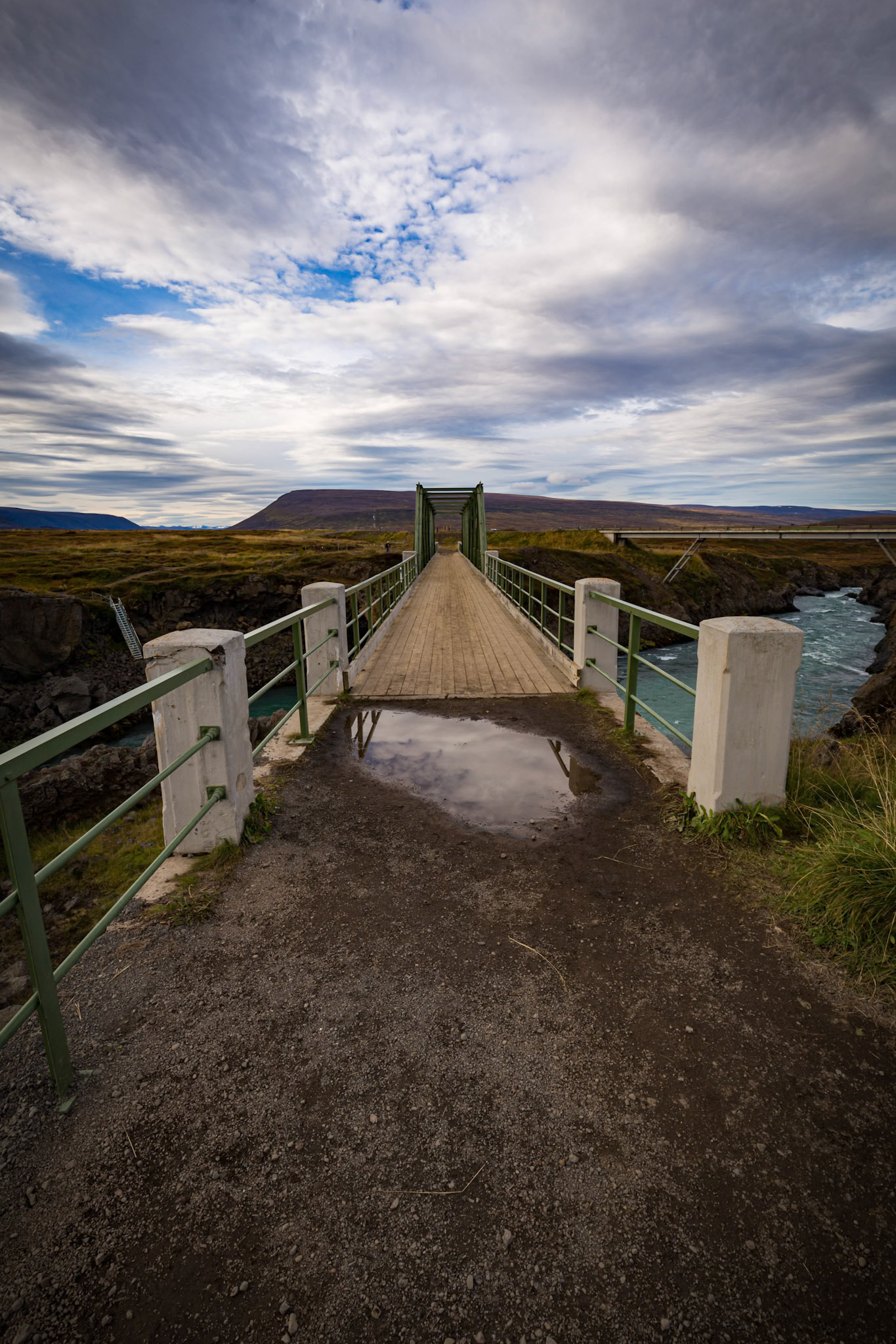 Bridge over water at Góðafoss Waterfall, Iceland