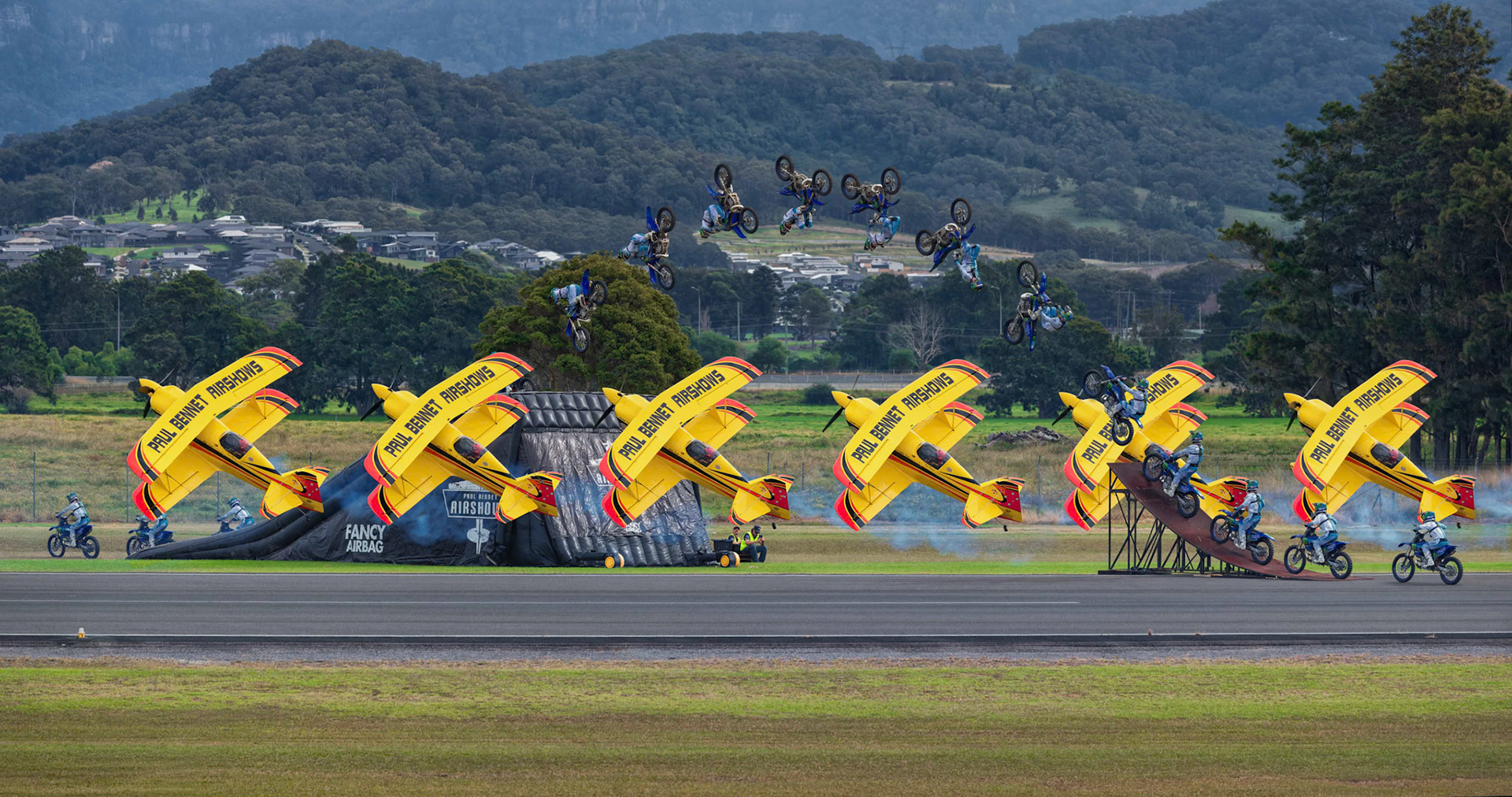 Paul Bennet and Wolf Pitts Pro with the FMX Knife-Edge Jump at the Wings over Shellharbour in Illawarra, New South Wales, Australia