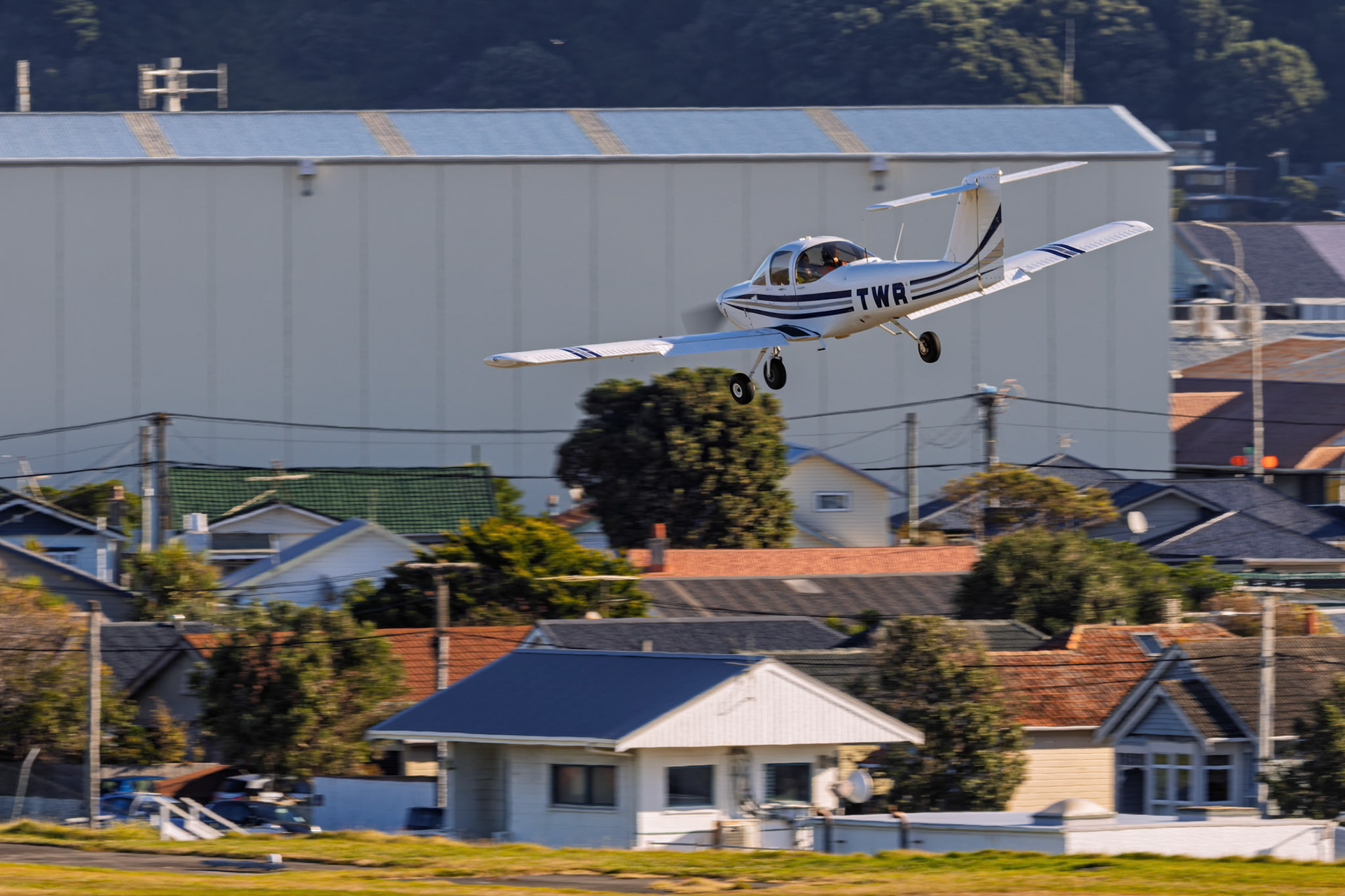 Aero Club Wellington Piper Tomahawk II [ZK-TWR] Arriving at Wellington Airport from Airport Lookout, New Zealand