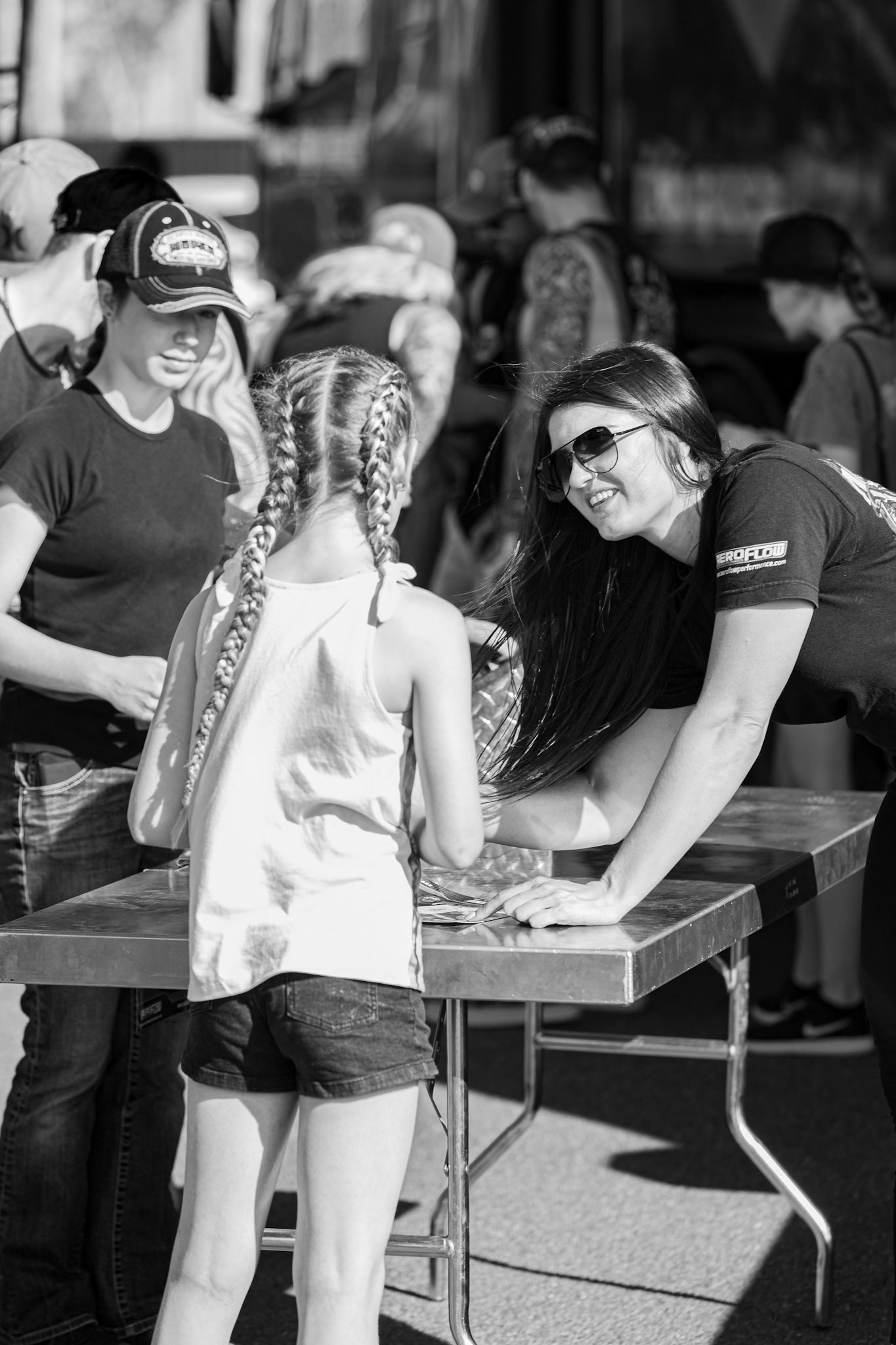 Chelsea Leahy signing autographs at the Aeroflow Outlaw Nitro Funnycar event on the 9th of November, 2019 at Willowbank Raceway in Queensland, Australia