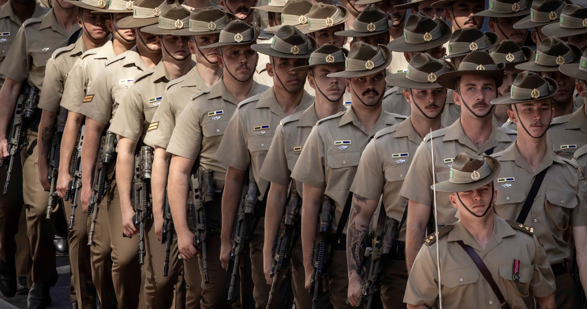 Marching Soldiers on parade at the ANZAC Day Parade in Brisbane City, Australia