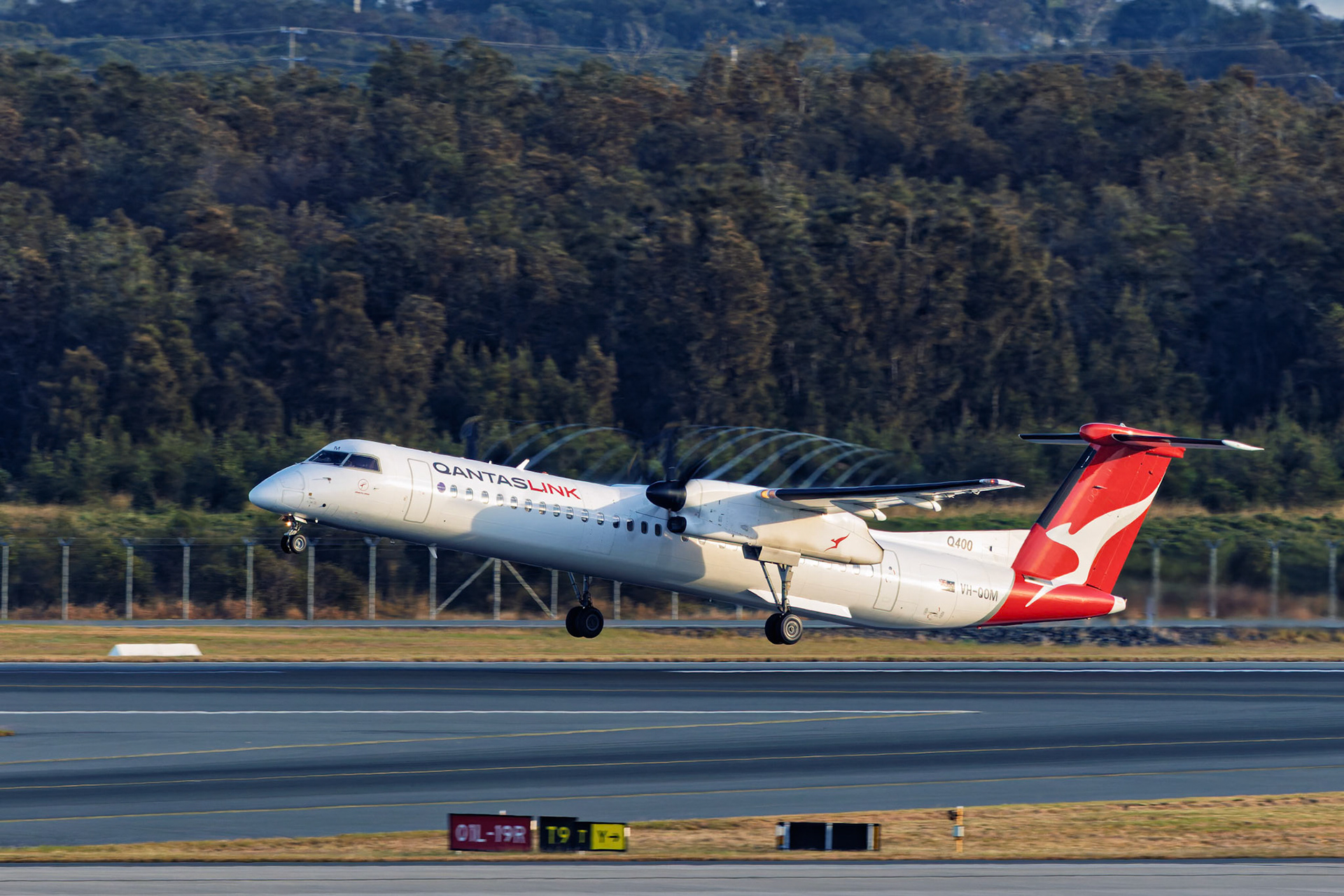 QantasLink De Havilland Canada Dash 8-400 [VH-QOM] Departing to Miles at the Brisbane International Airport, Australia