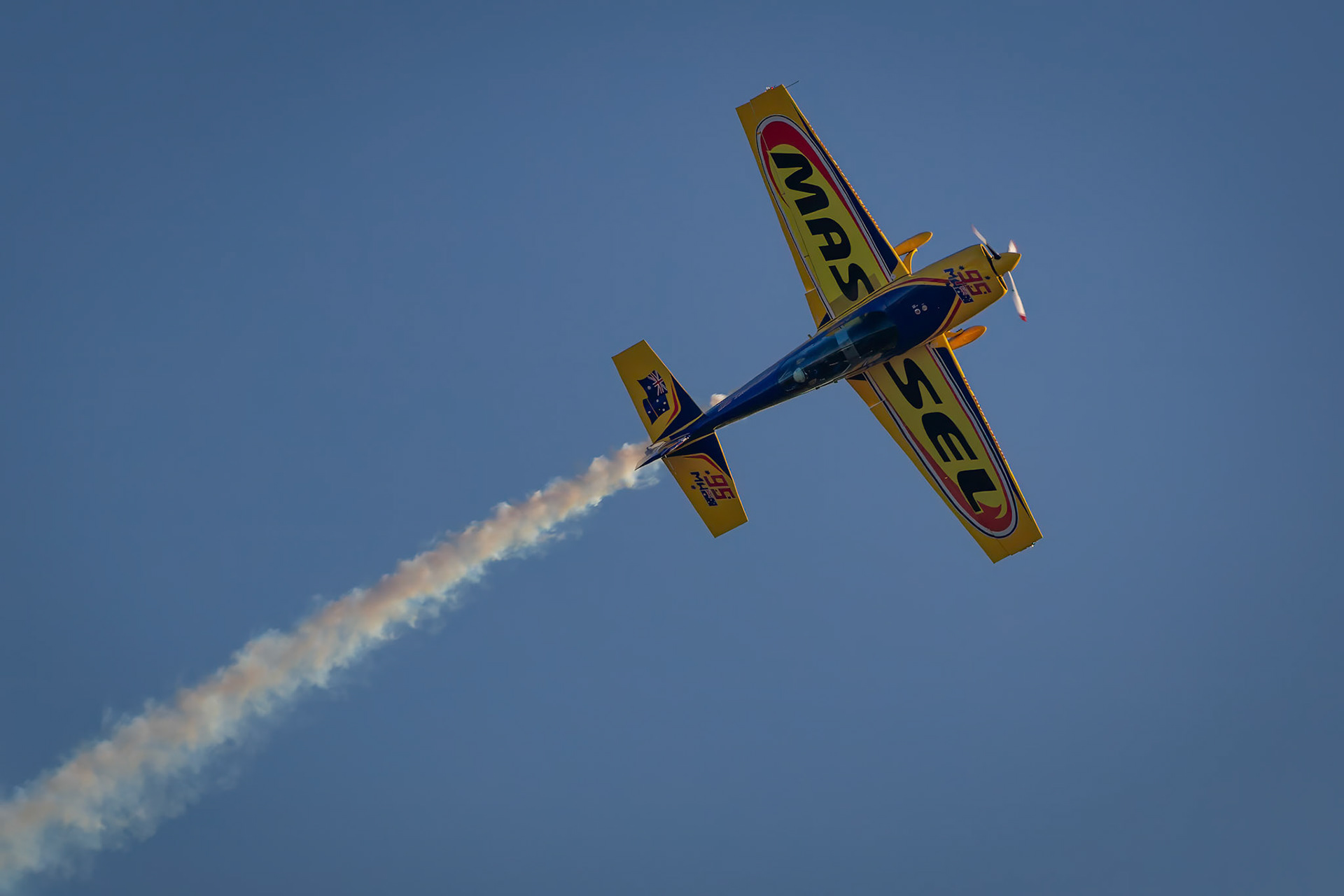 Matt Hall's Extra EA-300L during an Aerobatic on show at Wings Over Illawarra 2018, Illawarra Regional Airport, Albion Park Rail, New South Wales, Australia