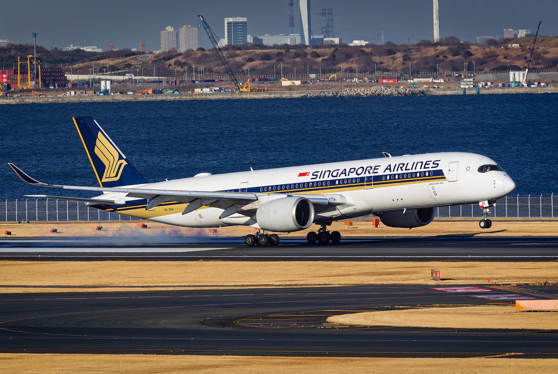 Singapore Airlines Airbus A350-941 (9V-SHA), Arriving from Singapore, captured from Terminal 2 viewing platform at Haneda Airport in Tokyo, Japan
