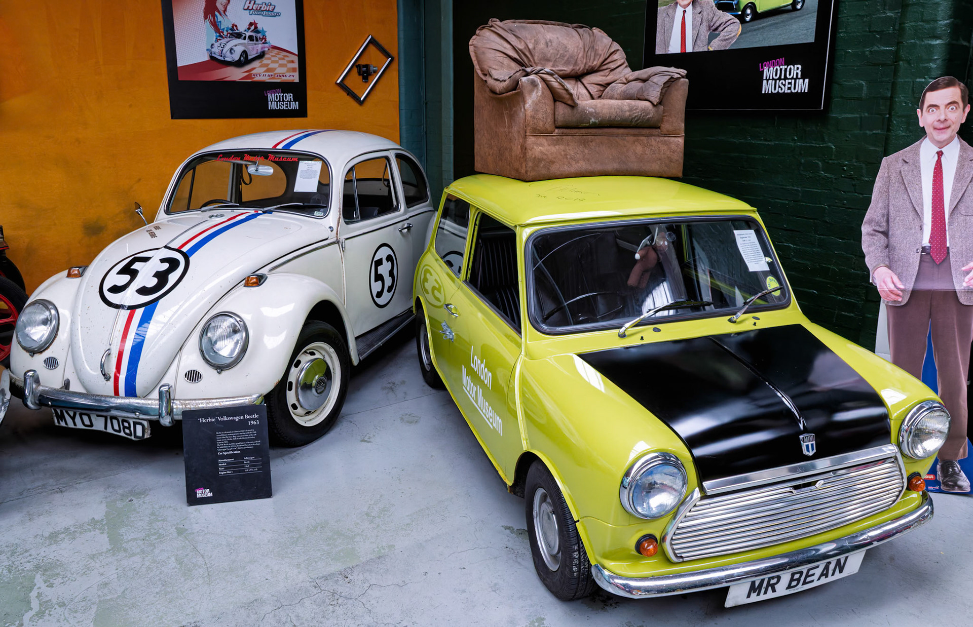 1976 British Leyland Mini 1000 'Mr Beans Car' and 1963 Volkswagen Beetle 'Herbie' at the London Motor Museum, England