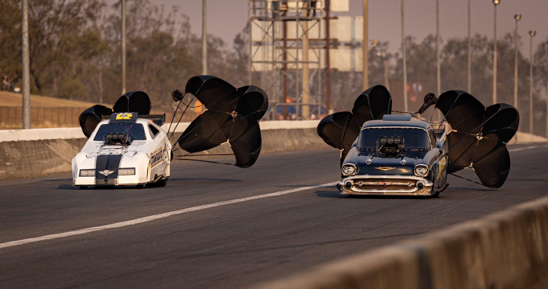 Competitors completing the run at the Aeroflow Outlaw Nitro Funnycar event on the 9th of November, 2019 at Willowbank Raceway in Queensland, Australia