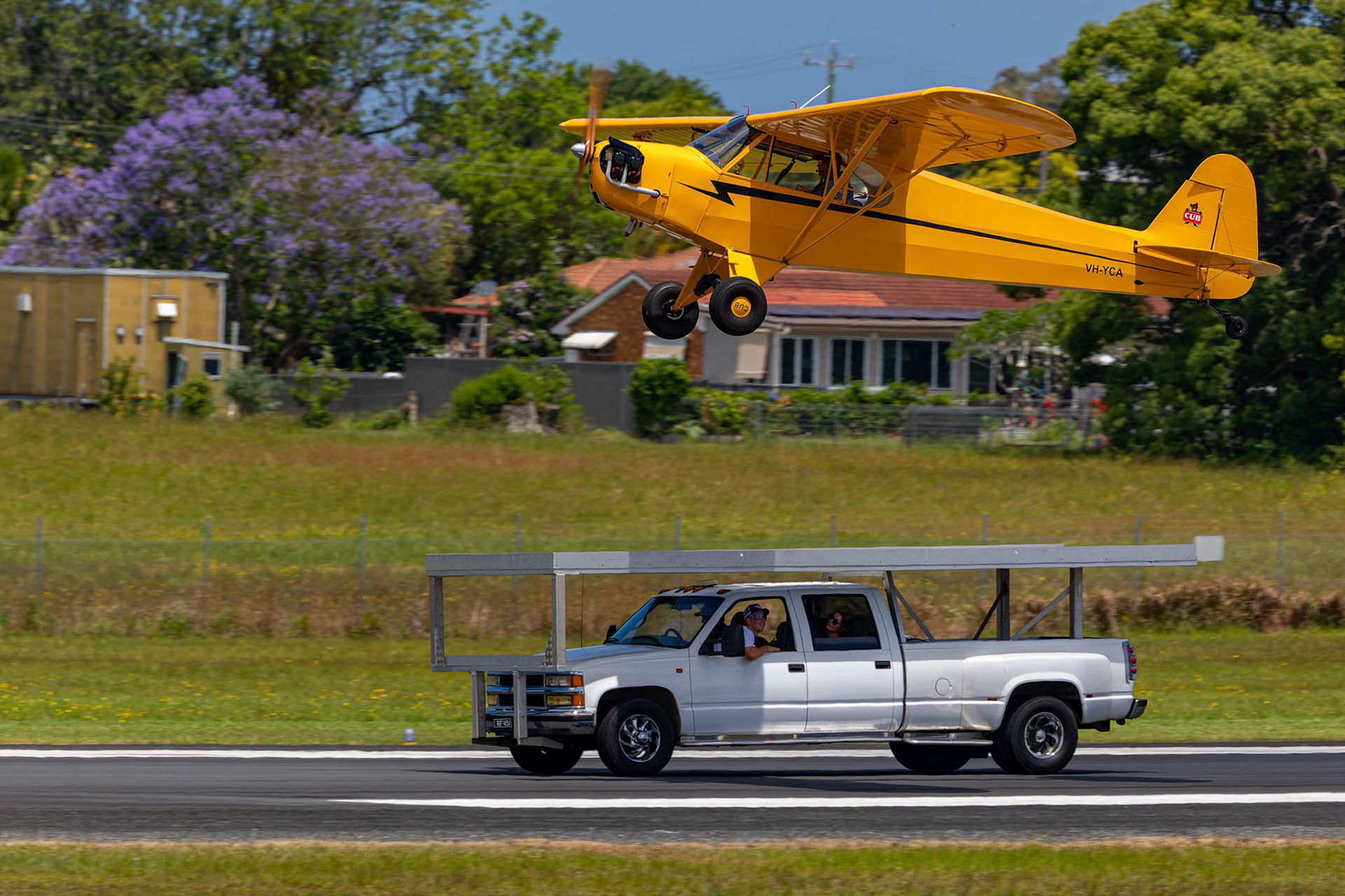 Paul Bennet in the Piper Cub [VH-YCA] Rolling Truck Landing Display at the Barrington Coast Airshow in Taree, New South Wales, Australia. 9th of November, 2024