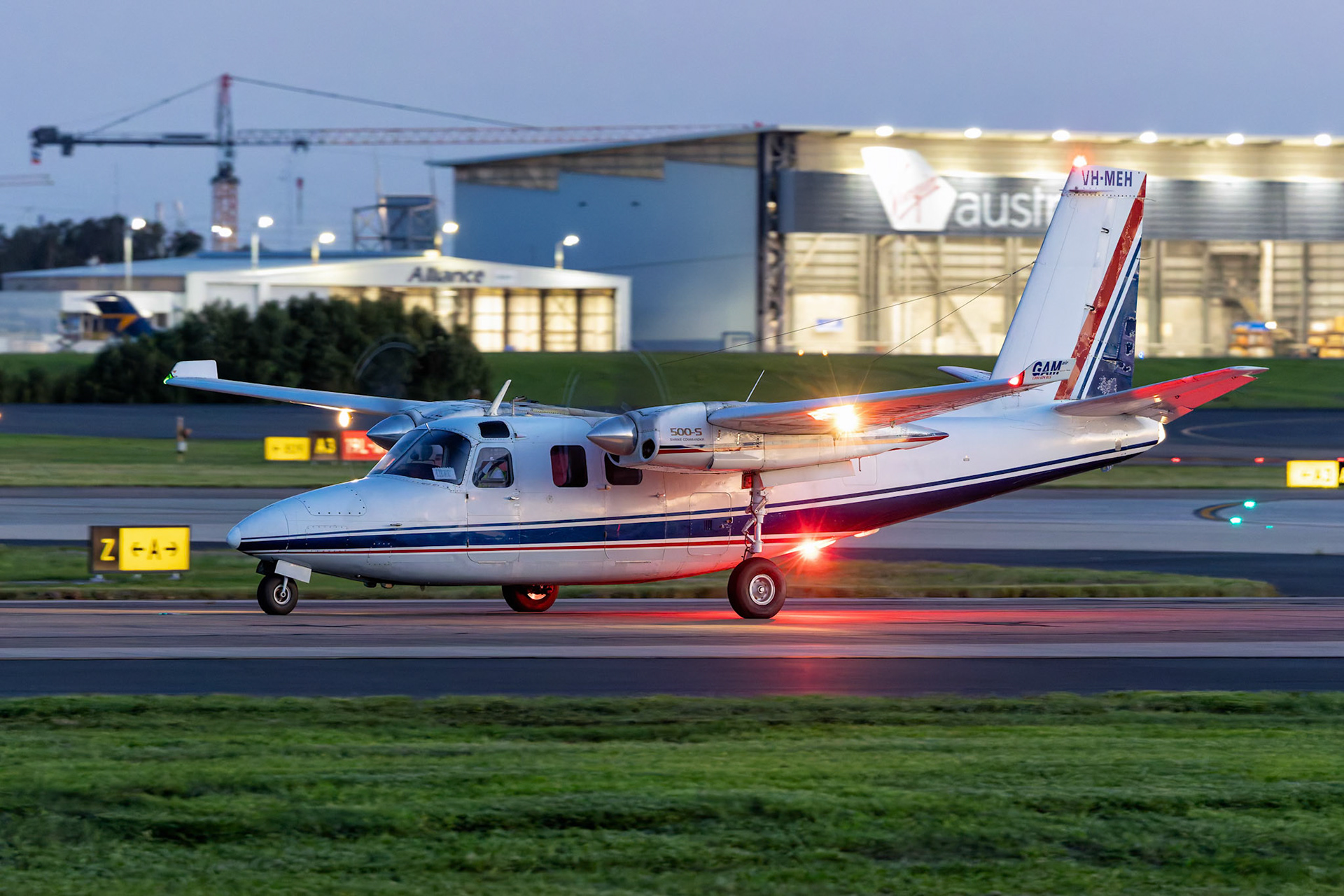 GAM Air Aero Commander 500S [VH-MEH] Arriving from Dalby at Brisbane International Airport, Australia