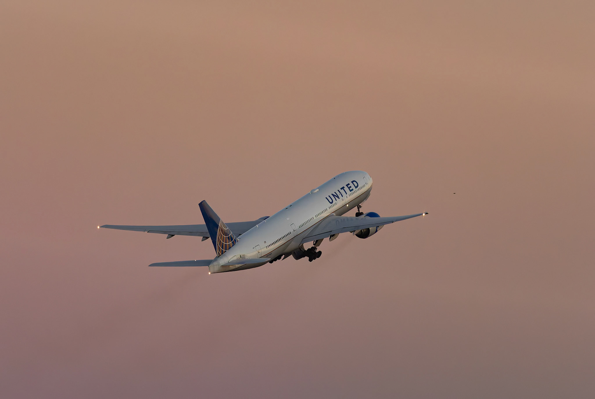 United Airlines Boeing 777-222ER (N224UA) Departing to Washington DC, captured from Terminal 2 viewing platform at Haneda Airport in Tokyo, Japan