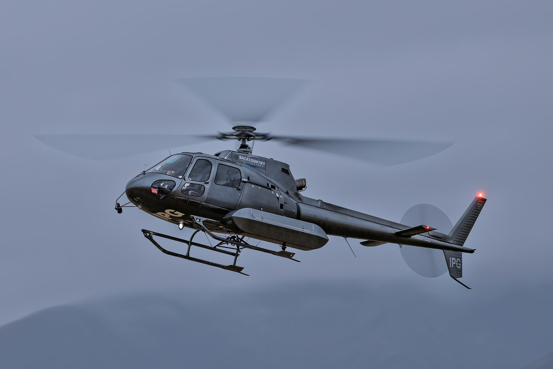 Airbus Helicopters H125 (Dark Grey) [ZK-IPG] on display at Warbirds over Wanaka, New Zealand