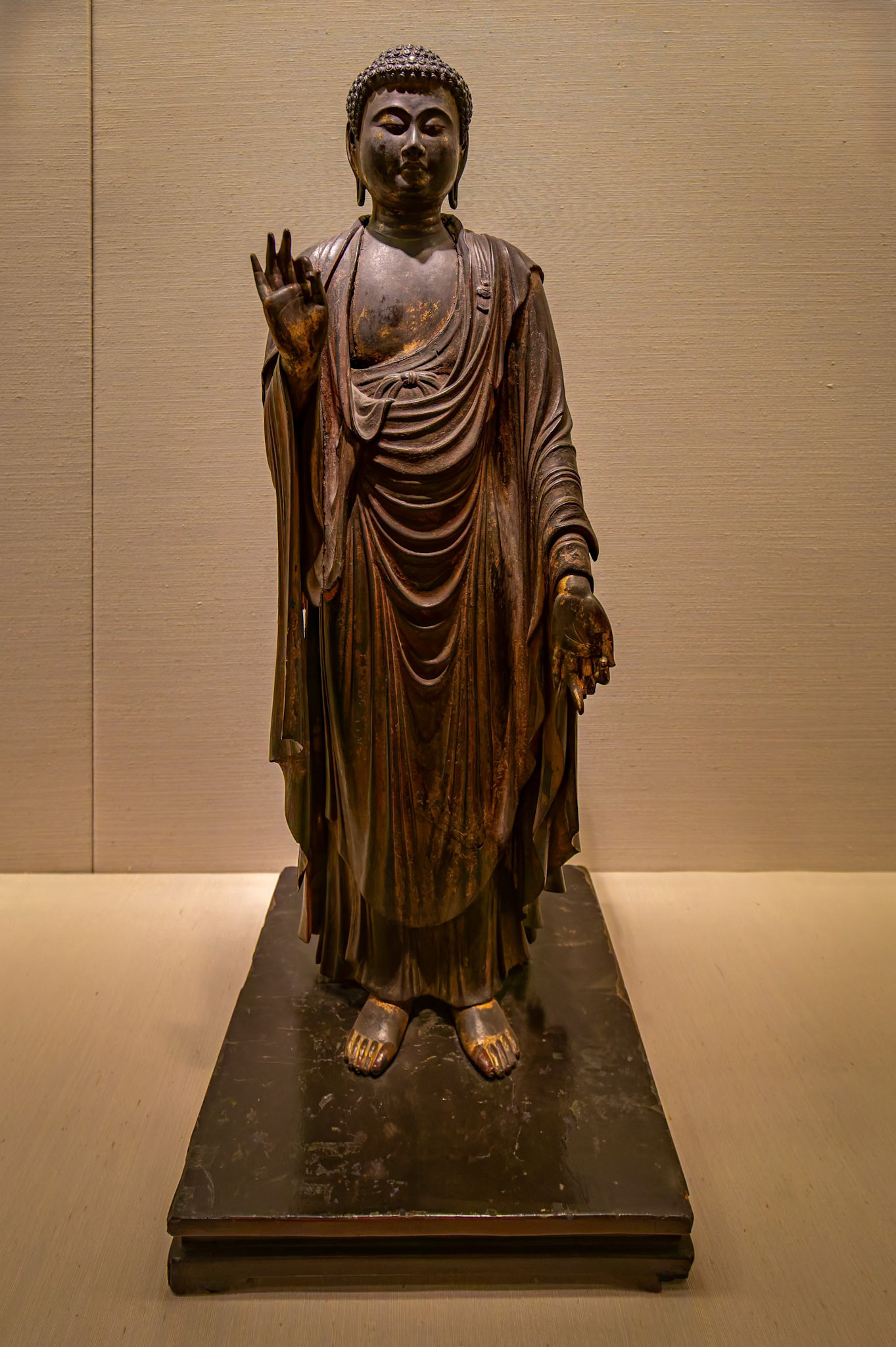 Statue of Buddha Amida on display at British Museum, London