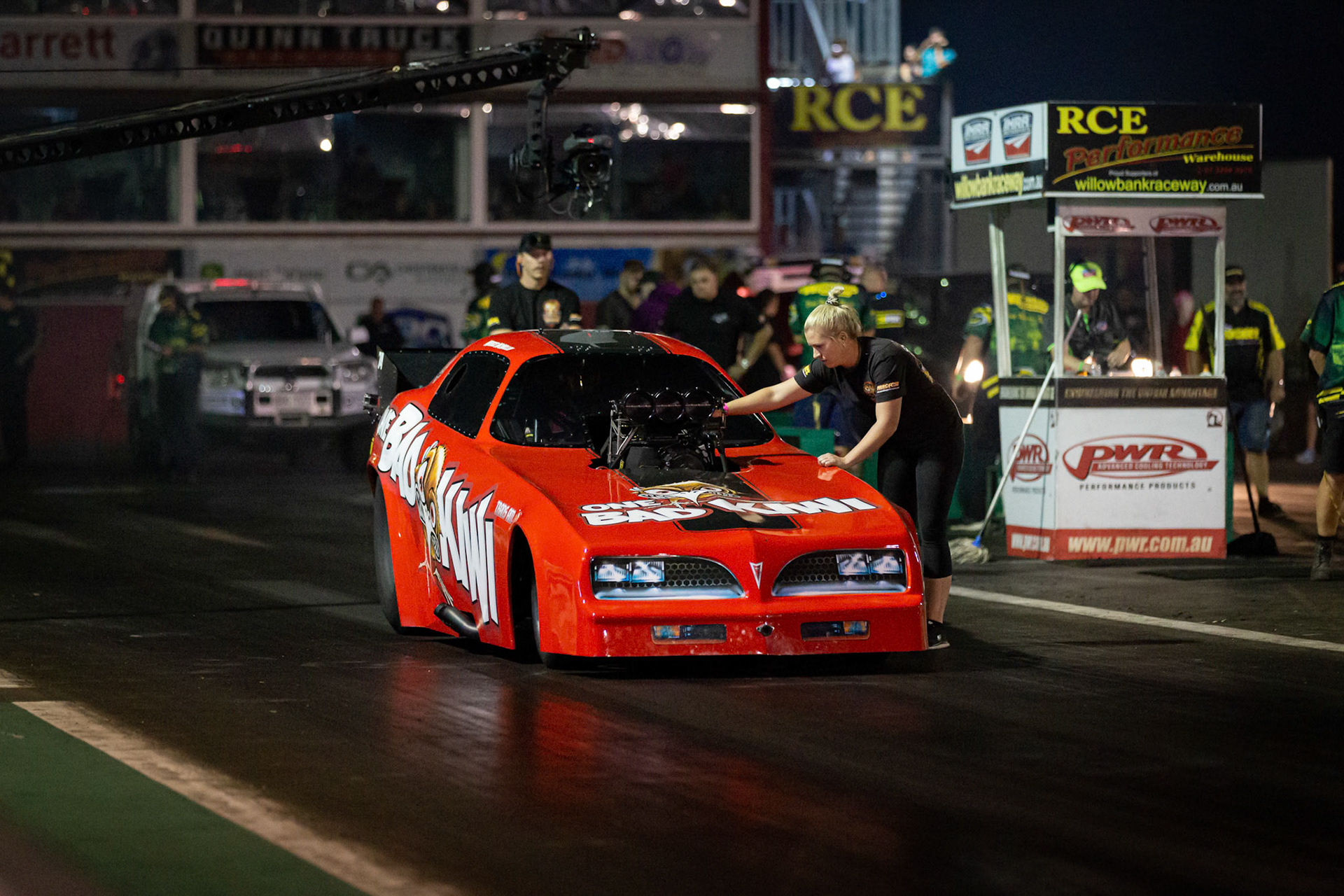Competitor 'One Bad Kiwi' starting a run at the Aeroflow Outlaw Nitro Funnycar event on the 9th of November, 2019 at Willowbank Raceway in Queensland, Australia