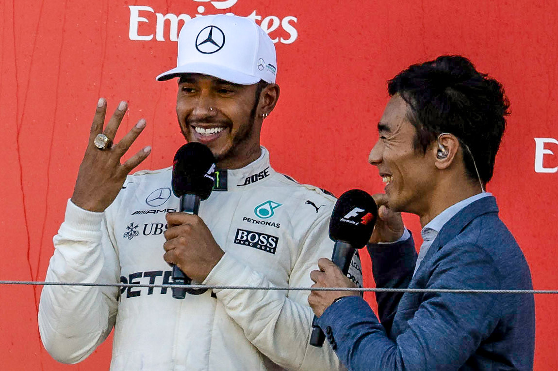 Mercedes driver Lewis Hamilton of England celebrating on the podium at Suzuka at the 2017 Formula 1 Japanese Grand Prix-----------------------Photographer: George Darwent (GDPhotos.com.au)Location: Suzuka Circuit, JapanDate: 8/10/2017Camera: Canon EOS 6D Mark IILens: Canon EF100-400mm f/4.5-5.6L IS II USM +1.4x III at 560mmShutter: 1/1250 at f8 - ISO 1600