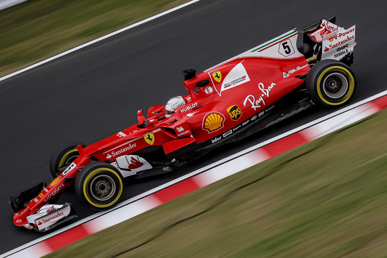 Ferrari driver Sebastian Vettel of Germany on track at Suzuka at the 2017 Formula 1 Japanese Grand Prix-----------------------Photographer: George Darwent (GDPhotos.com.au)Location: Suzuka Circuit, JapanDate: 6/10/2017Camera: Canon EOS 6D Mark IILens: Canon EF100-400mm f/4.5-5.6L IS II USM at 176mmShutter: 1/160 at f5 - ISO 100