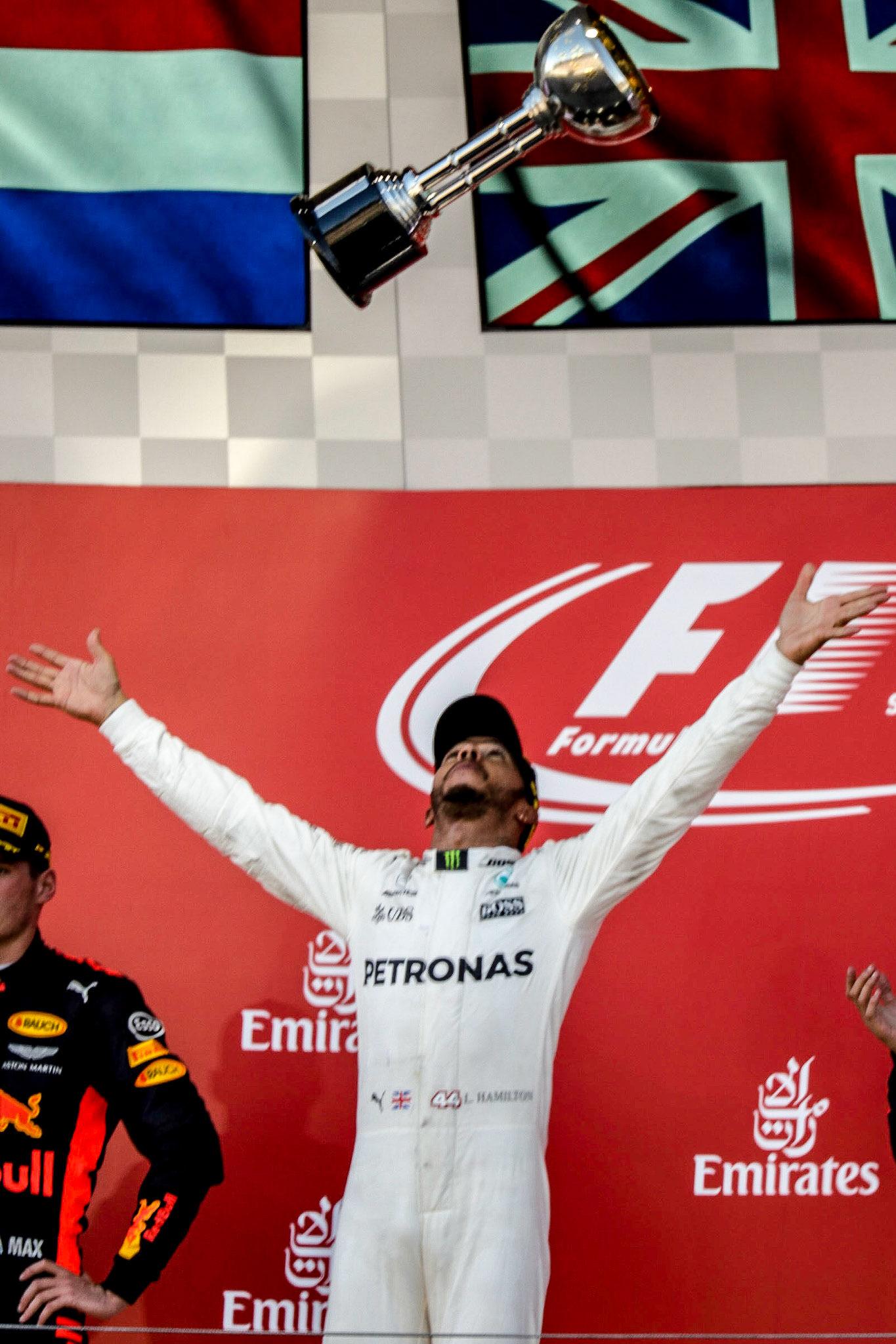 Mercedes driver Lewis Hamilton of England celebrating on the podium at Suzuka at the 2017 Formula 1 Japanese Grand Prix-----------------------Photographer: George Darwent (GDPhotos.com.au)Location: Suzuka Circuit, JapanDate: 8/10/2017Camera: Canon EOS 6D Mark IILens: Canon EF100-400mm f/4.5-5.6L IS II USM +1.4x III at 560mmShutter: 1/400 at f8 - ISO 800
