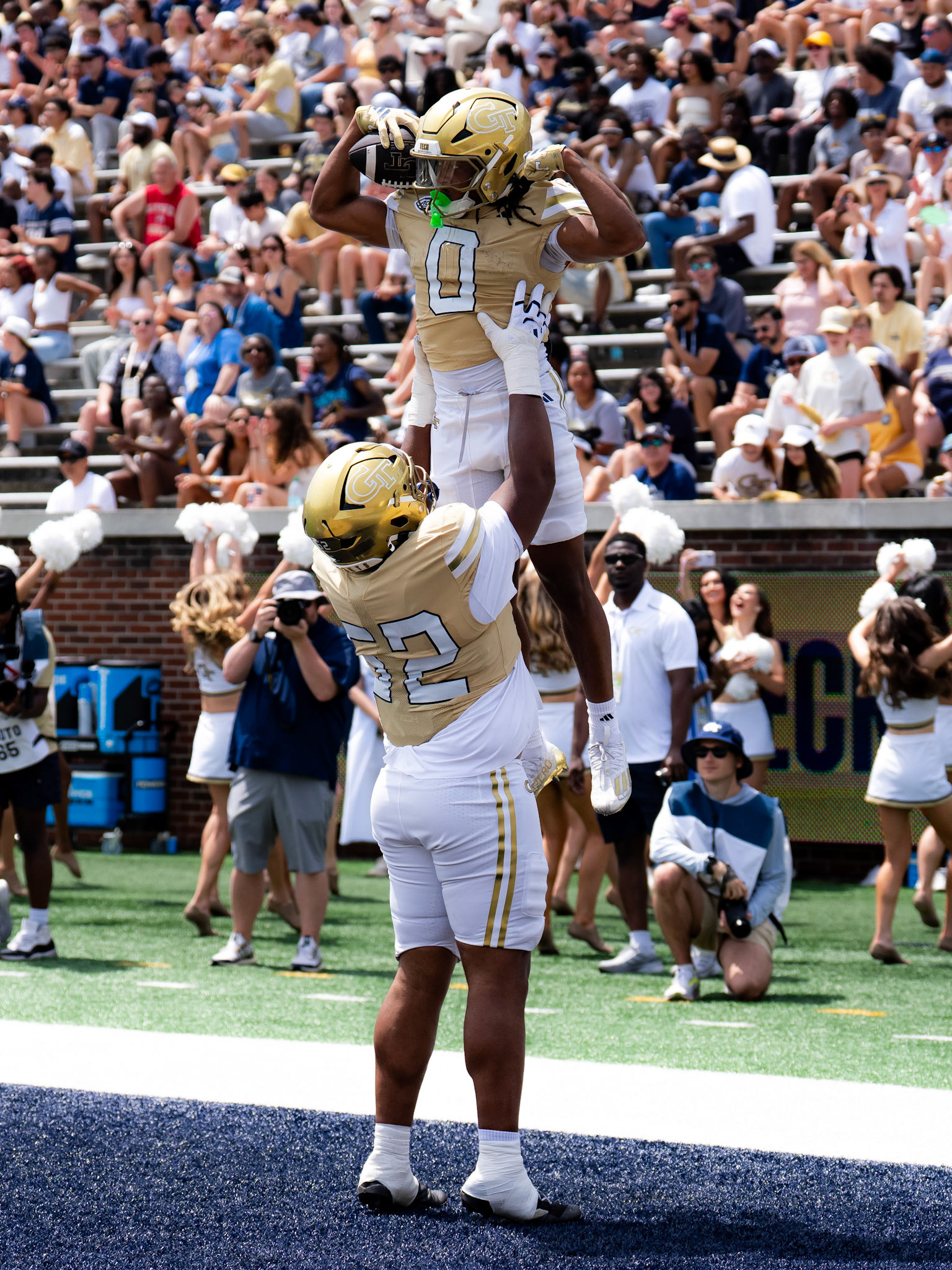 Georgia Tech running back Malachi Hosley (0) celebrates with teammates after a touchdown run.