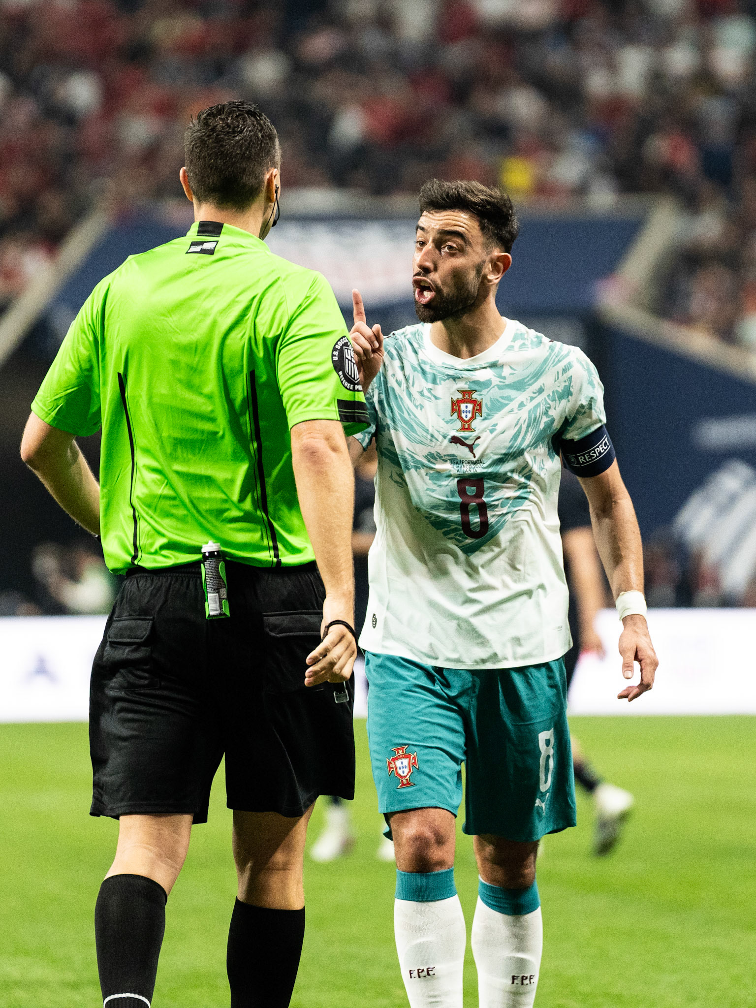 Portugal captain Bruno Fernandes reacts to a referee’s decision during a match against the USMNT.