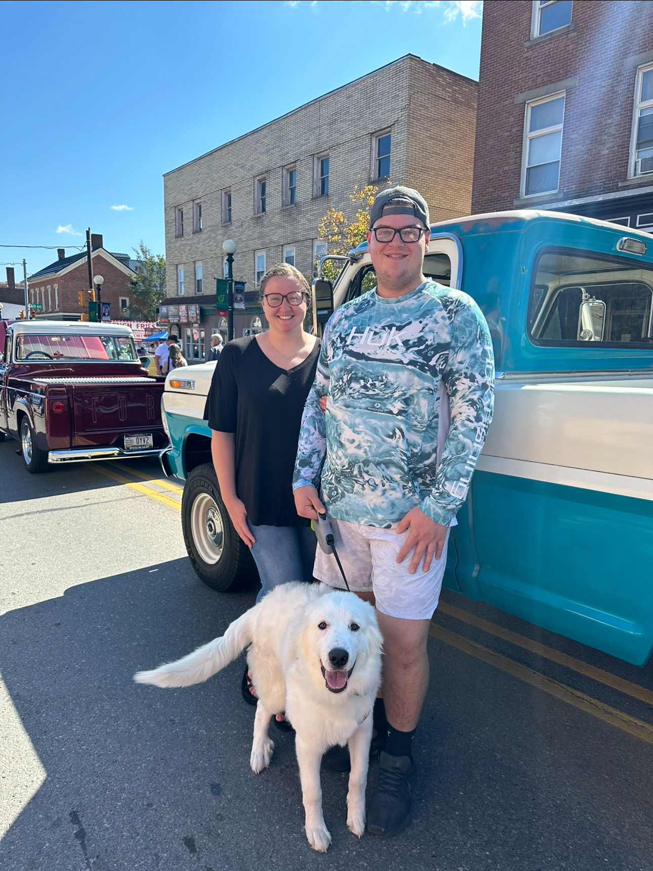 My husband, our pup and I at an antique car show