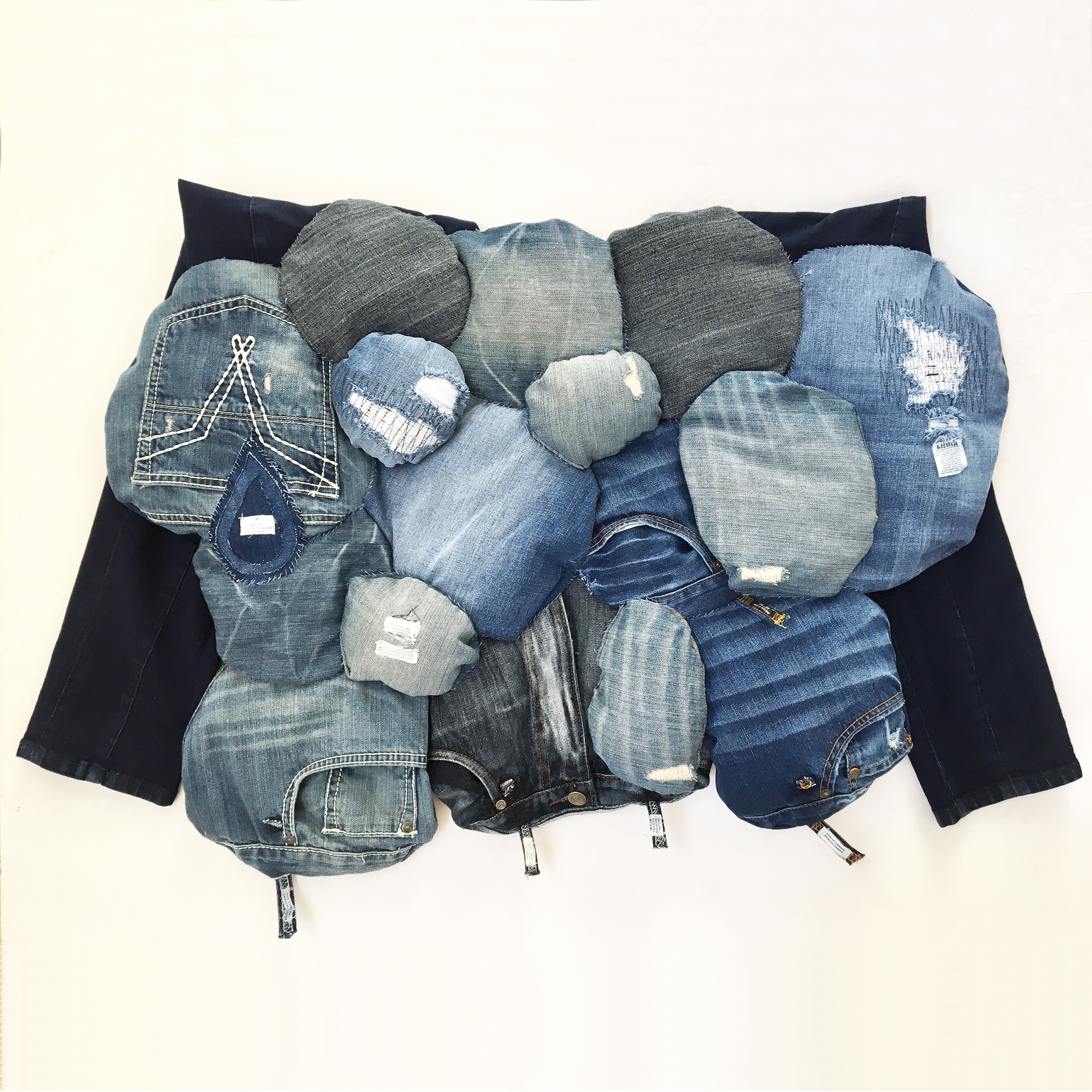 The Complexities of Denim (2018) thrift store denim, thread, ventilator mask // Commission for the University of Iowa Museum of Art and Hello Flyover. Curated by Vero Rose Smith.  This is a full view of the layout and color variations