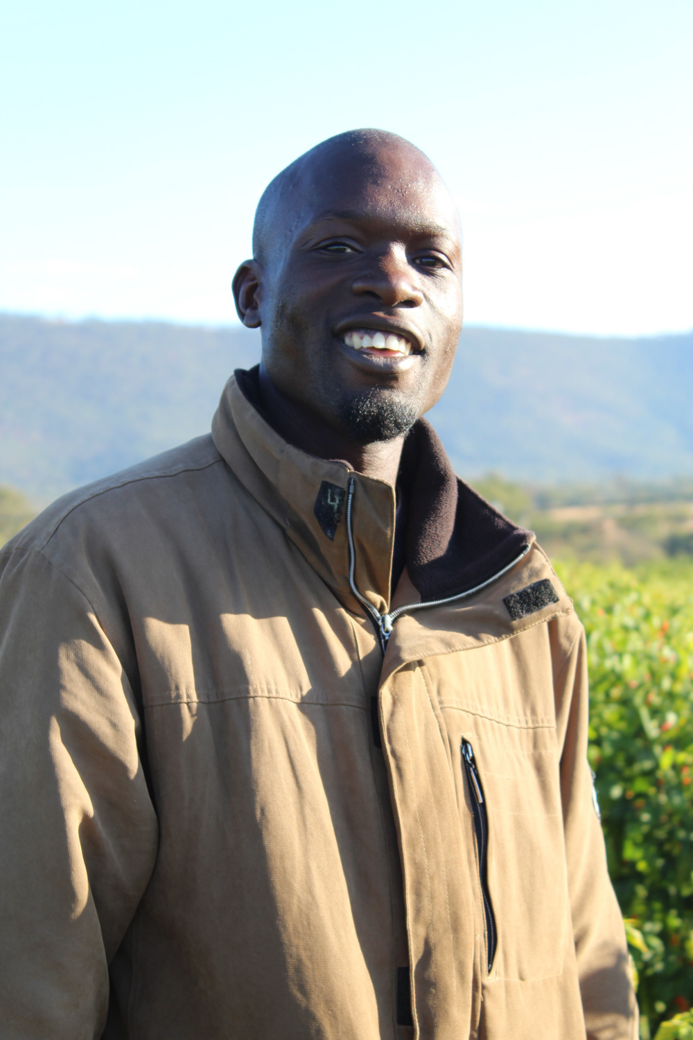 Farm foreman Nigel is a young graduate who moved to Shamva for the job.