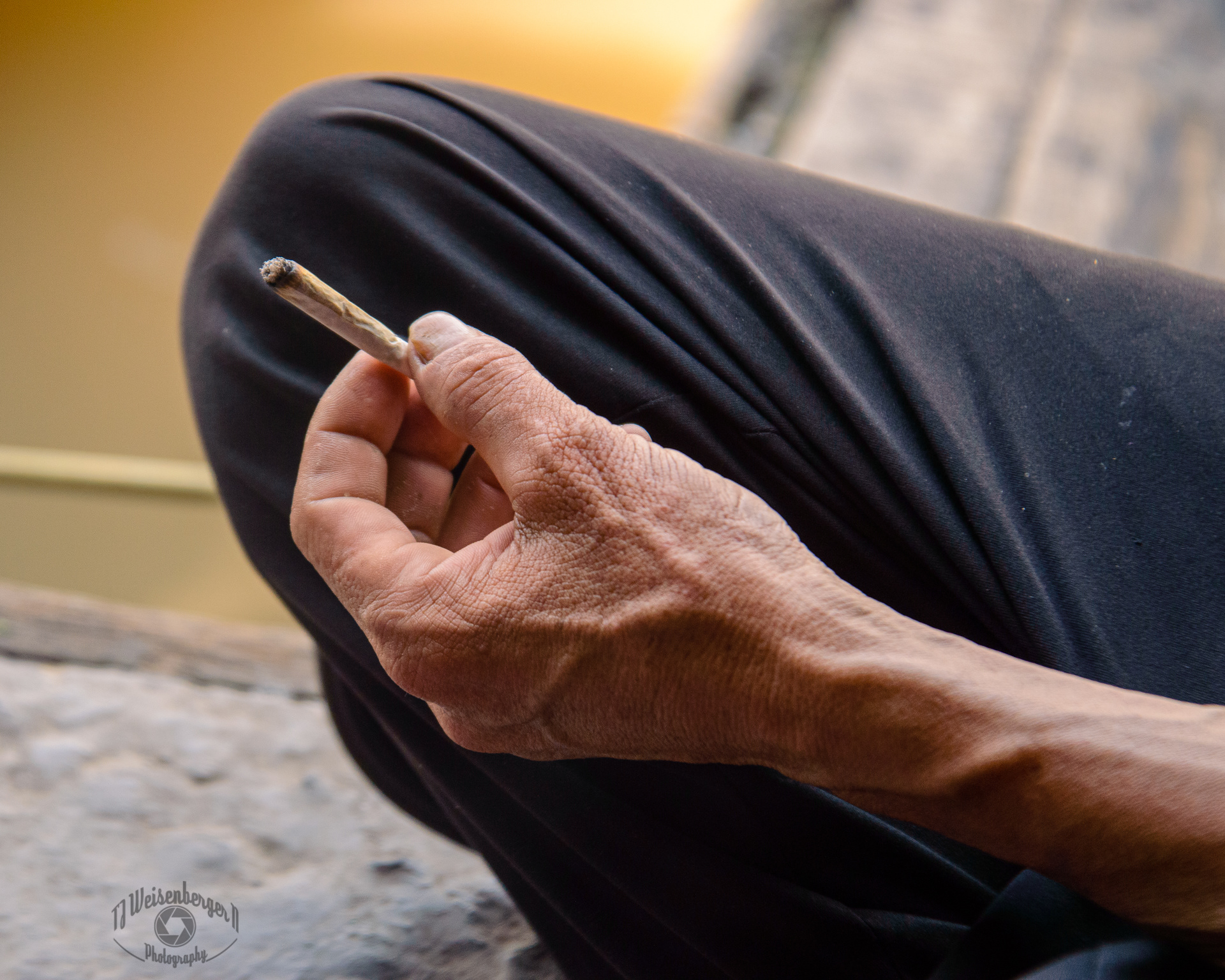 Hands Cai Rang Floating Market Boatman Smoking Handrolled Cigarette - Can Tho, Vietnam
