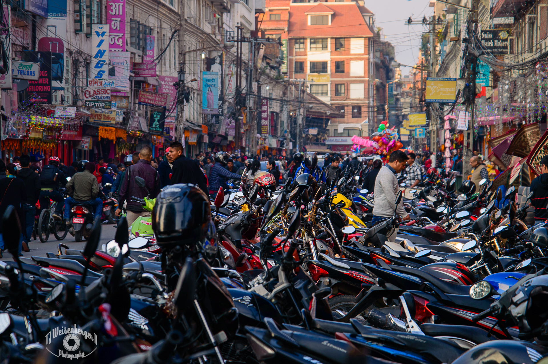 Motorcycle Parking, Street Photography Nepali Markets - Kathmandu, Nepal; Asia; Bazaar Market; Capital City; Colors; Cultures; Horizontal; Kathmandu; Motorbikes; Multi Colored; Nepal; Nepali; Photography; Shopping; Street; Street Market; Tourism; Tradition; Travel; Travel Destinations; market; motorcycles; street photography; TJ; Weisenberger