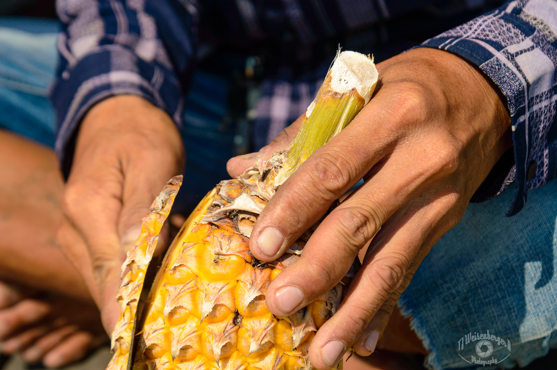 Hands Cai Rang Floating Market Vendor Peels Pineapple - Can Tho, Vietnam