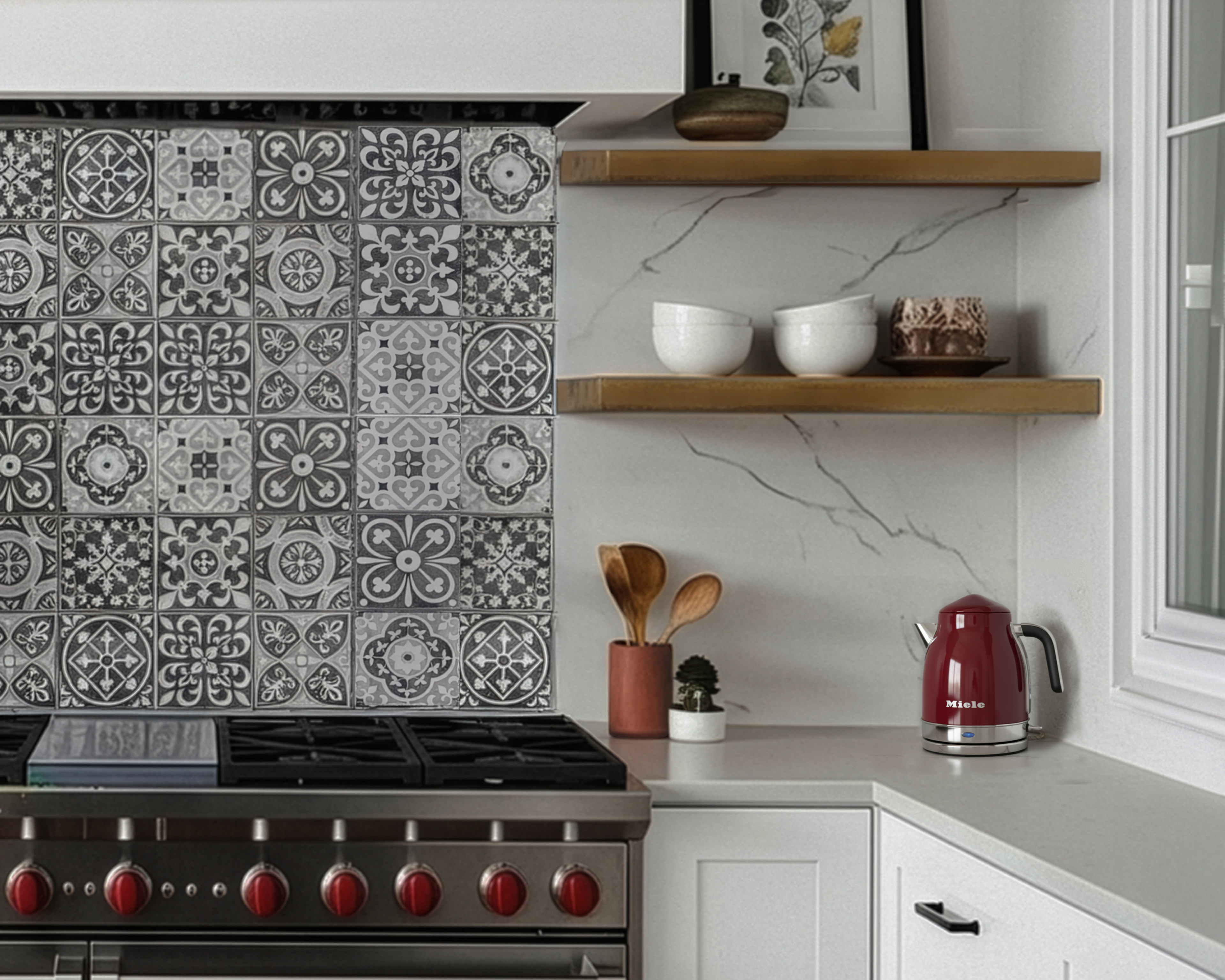 A luxury kitchen with a Moroccan tile backsplash, white shaker cabinets, and a professional stainless steel Wolf range