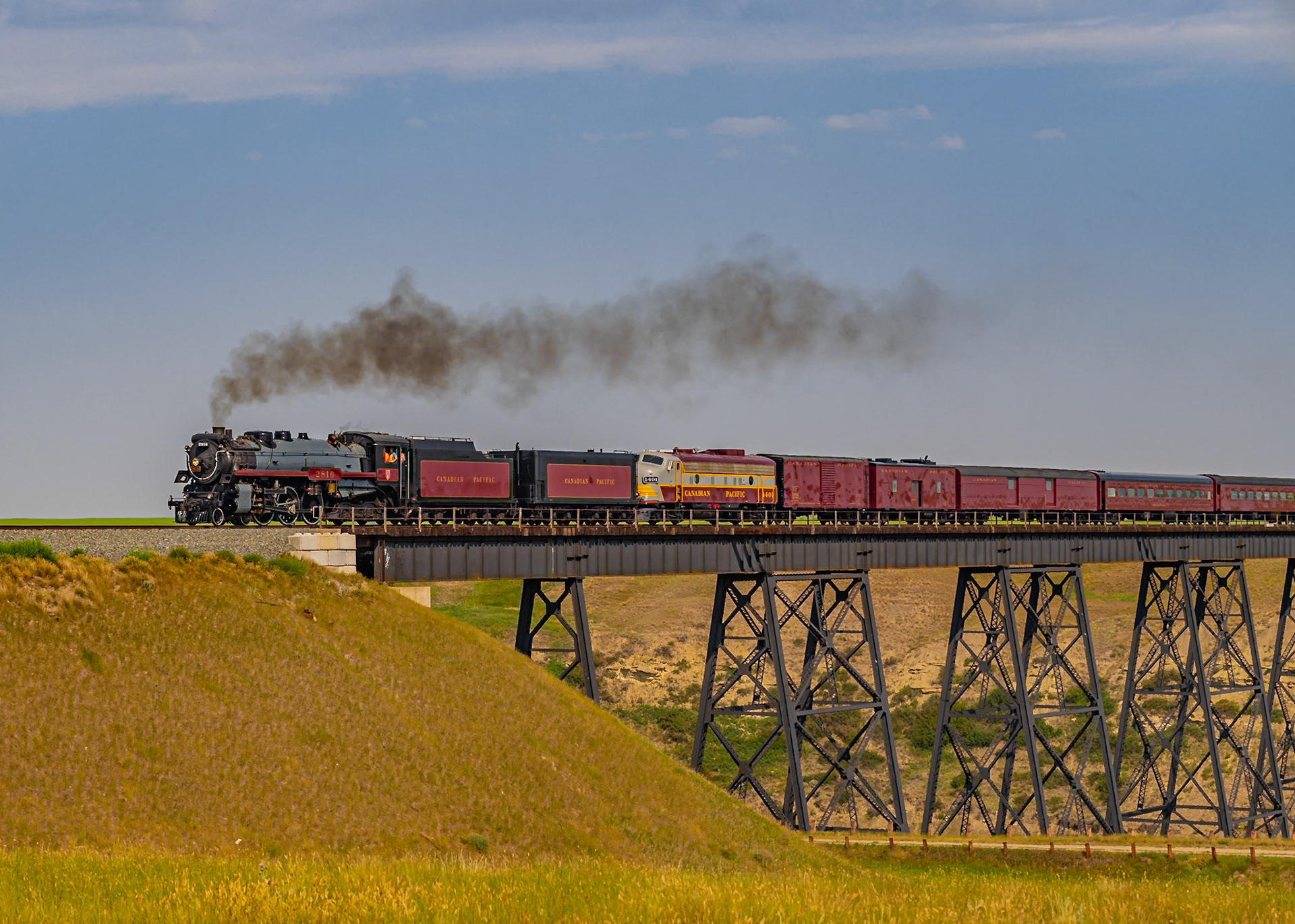 2816 Crossing the Trestle Bridge in Carmangay Alberta on an August 2023 Test Run