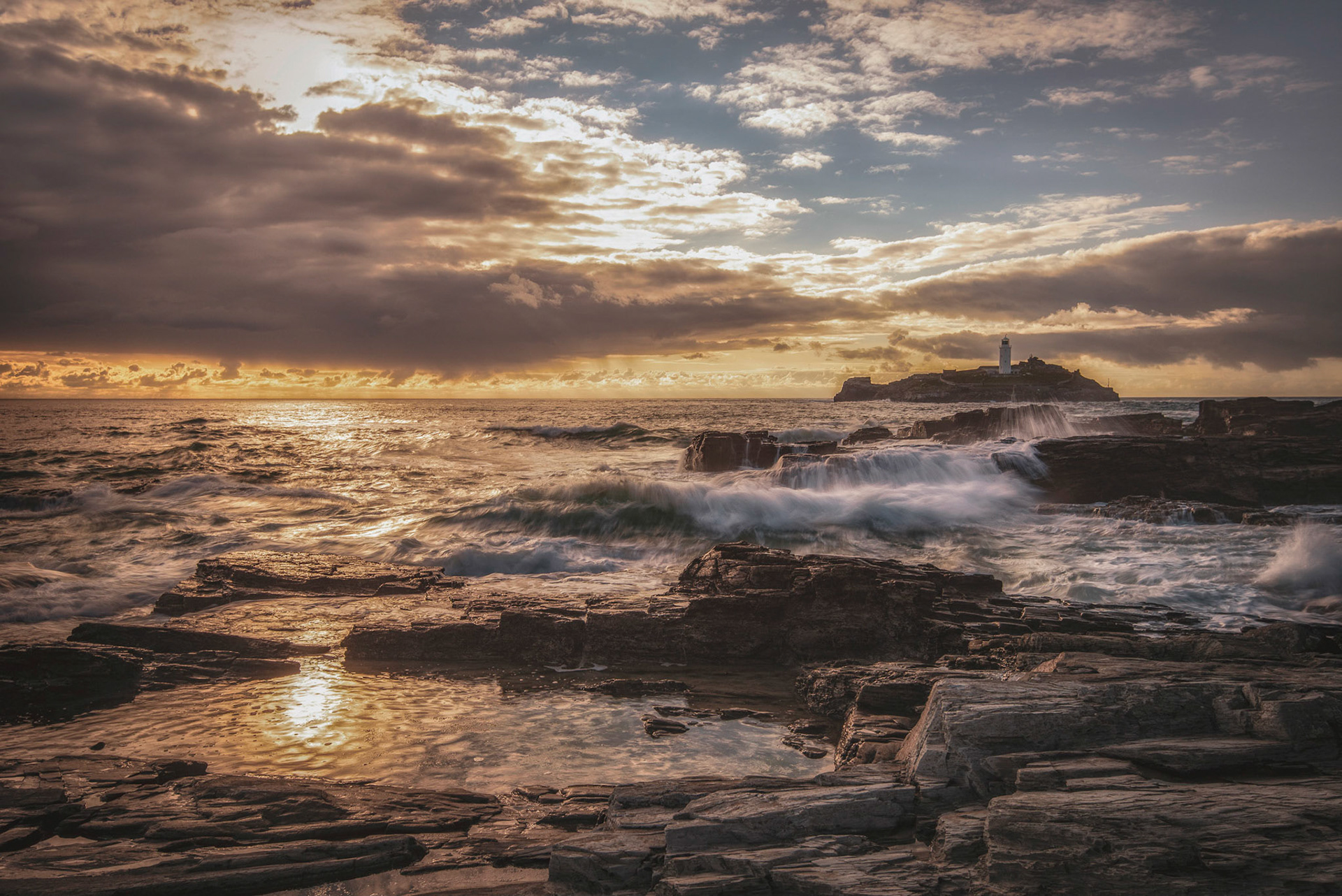 Gwithian Beach looking towards Godrevy Lighthouse in Cornwall.