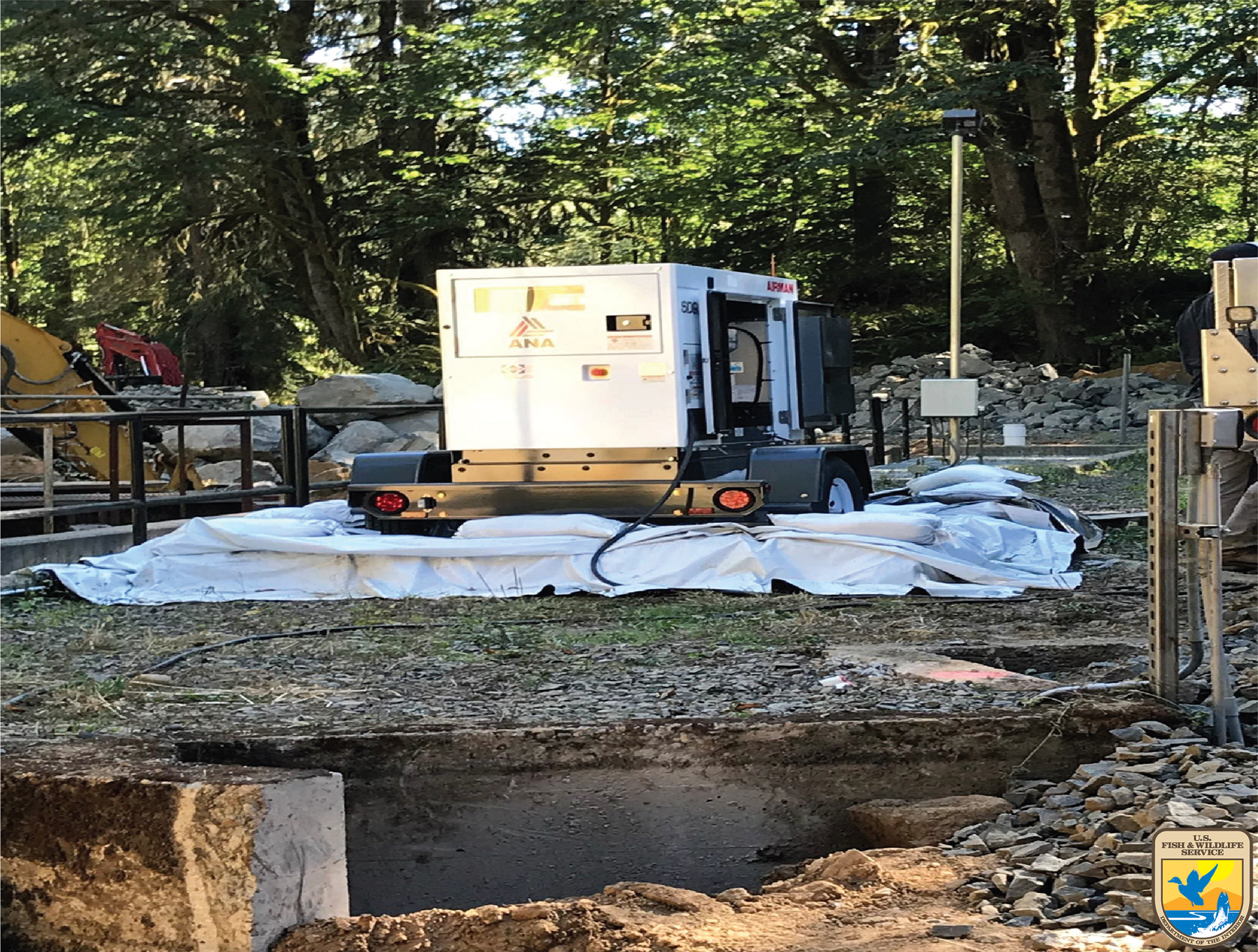 During Restoration: Pumps were placed in impervious basins to contain any fuel spills.