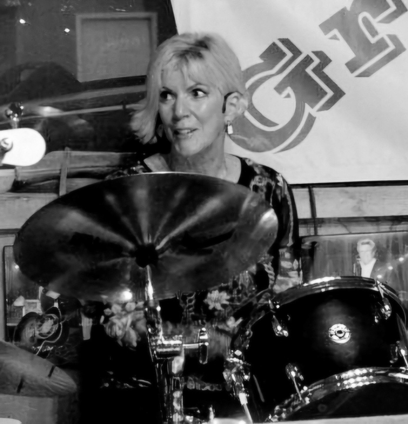 Sheila Brown: Drums / Vocals • Sheila started learning drums at age four from her father, a professional drummer. She now plays a wide range of genres, including rock, jazz, country, big band, musical theatre, and symphonic band. She performs with several regional bands and has the opportunity to collaborate with some of the finest musicians in northern Michigan.