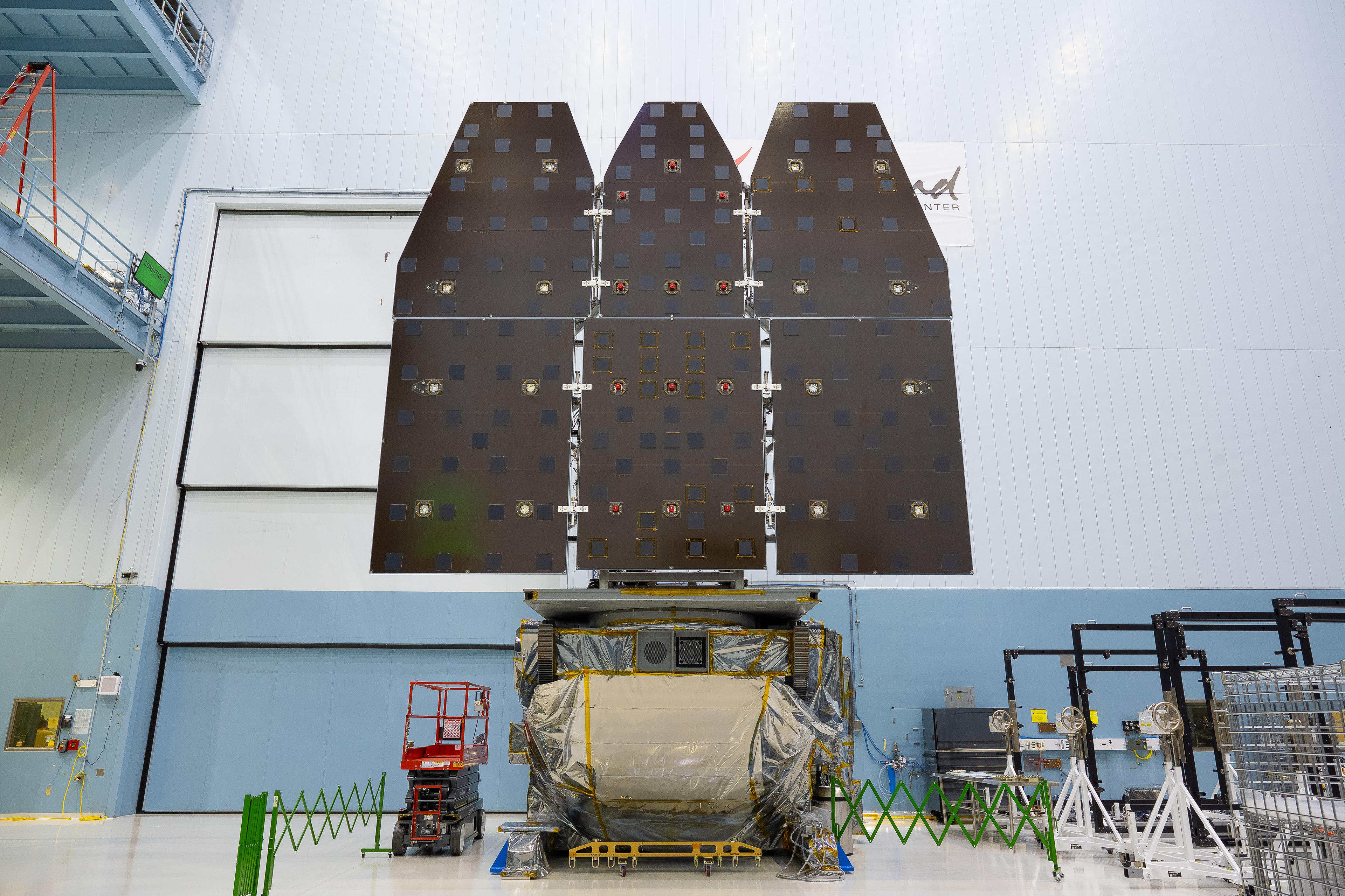 Roman Space Telescope's Solar Array Sun Shield panels fully deployed on the Outer Barrel Assembly.