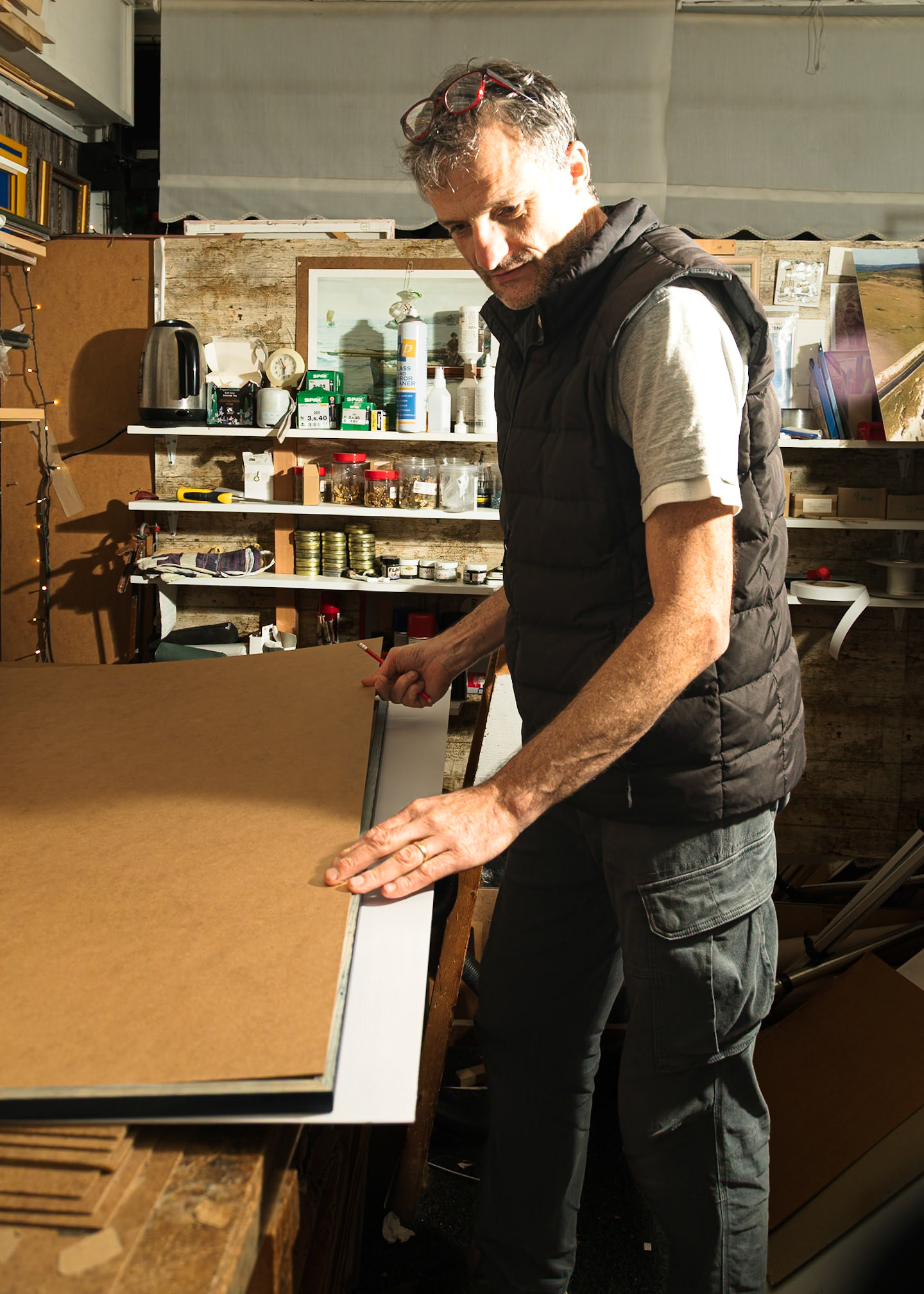 Ric working late at Art Frames
