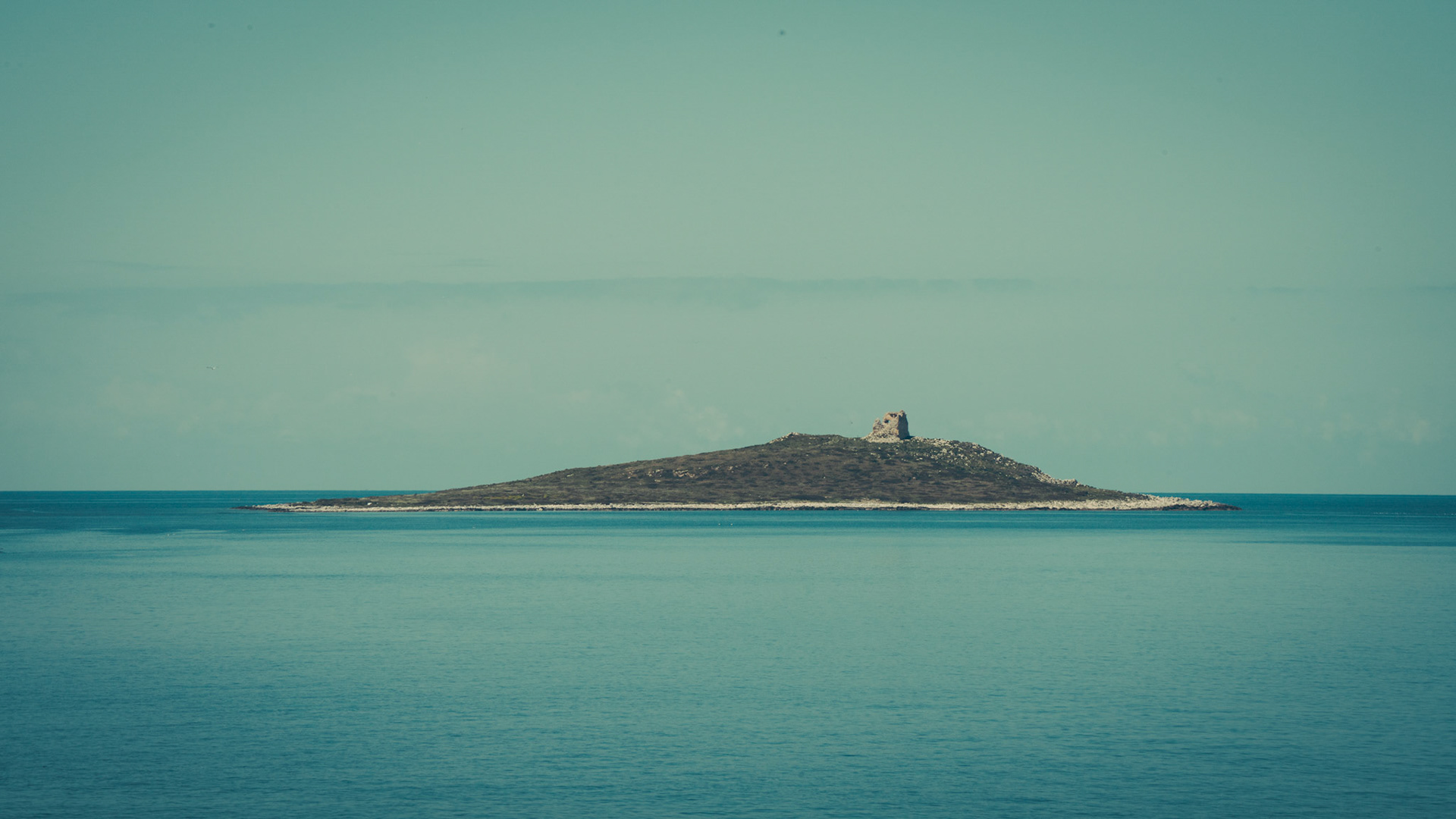 Unknown Island with Old Tower Ruins